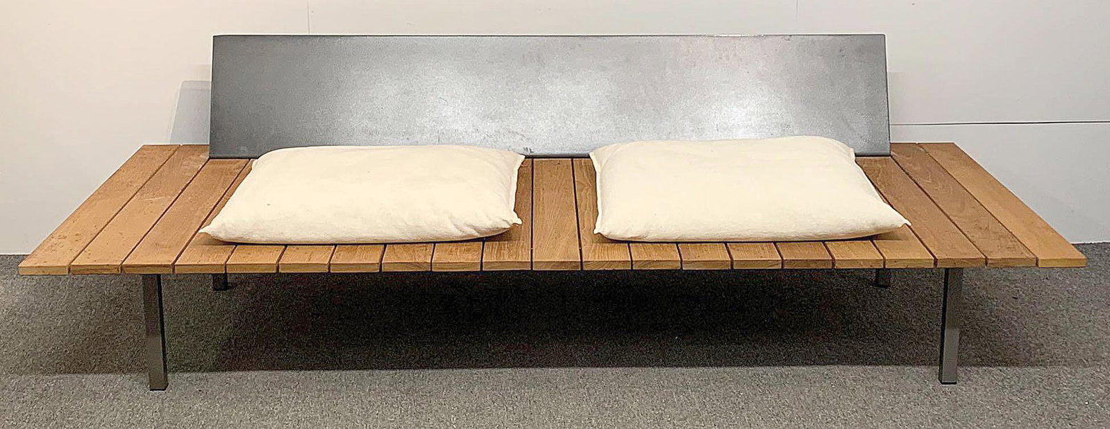 Modernist Slatted Wood and Steel Bench: A custom made modernist slatted wood and steel minimalist bench with two linen upholstered cushions. Unmarked. 23in tall x 78in long x 38in wide.