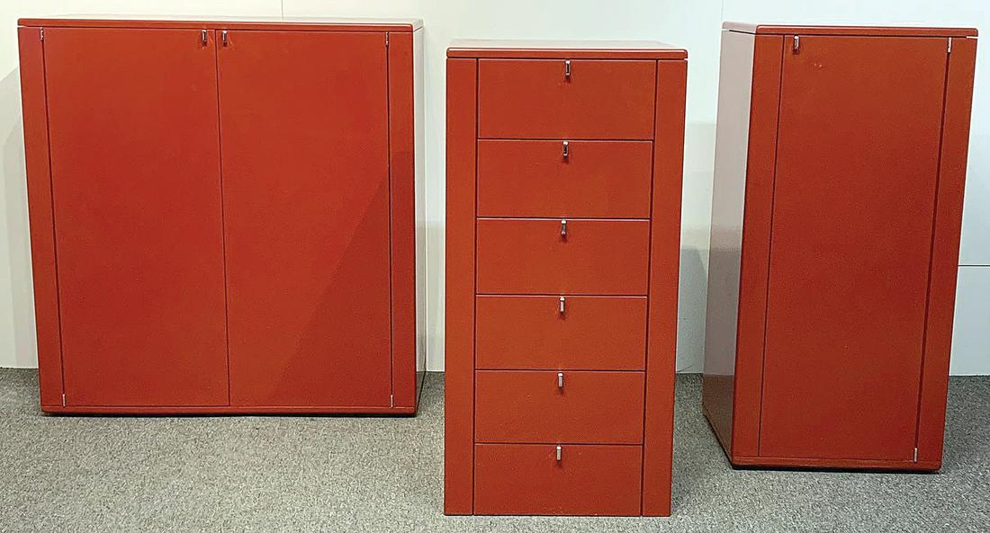 Three Interlubke Modern Design Storage Cabinets: A grouping of three Interlubke red lacquered modern design modular storage cabinets. Western Germany. Largest: 40in tall x 39in wide x 19in deep.