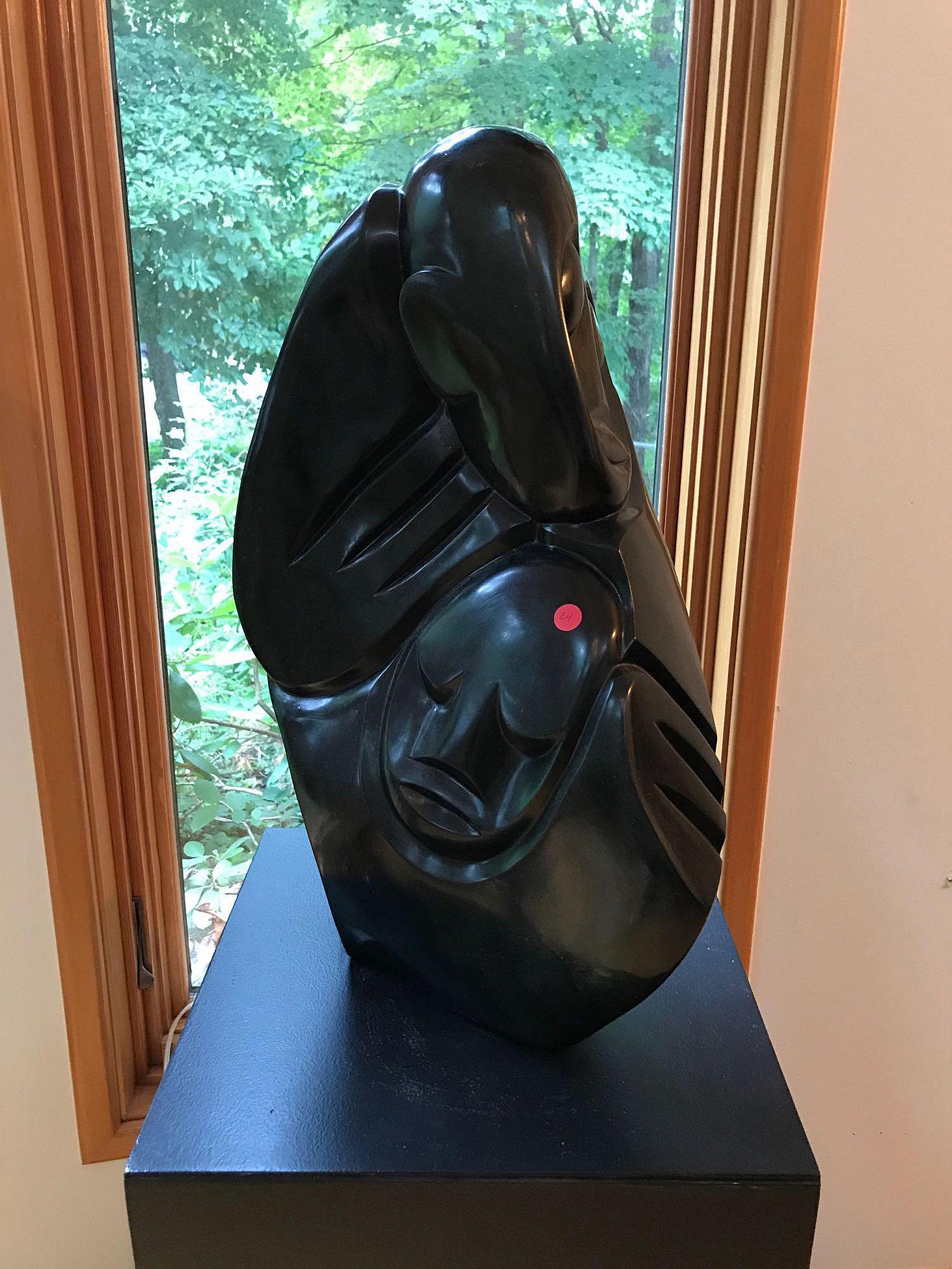 Richard Mteki. Shona Stone Sculpture, Father/Son: A Richard Mteki Zimbabwean Shona stone sculpture titled "Father and Son". 25in tall x 15in wide. Provenance: From the Estate of Bruce M. Herzog, Pipersville, PA.