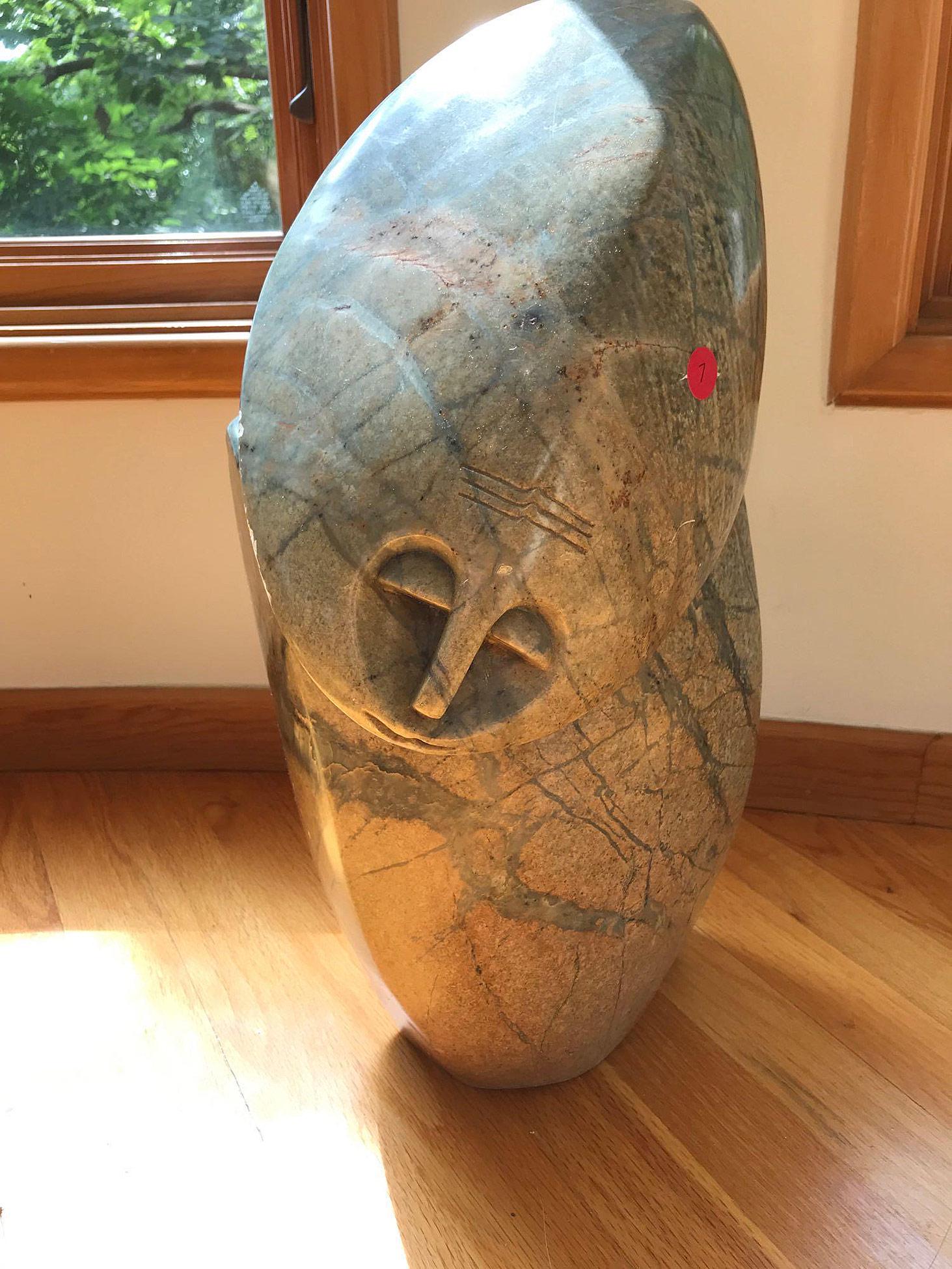 Michael Chiwandre. Shona Stone Sculpture: A Michael Chiwandre Zimbabwean Shona stone sculpture, titled "Memories of My Good Life". 19-1/2in tall x 9in wide Signed on back. Provenance: From the Estate of Bruce M. Herzog, Pipersville, PA.
