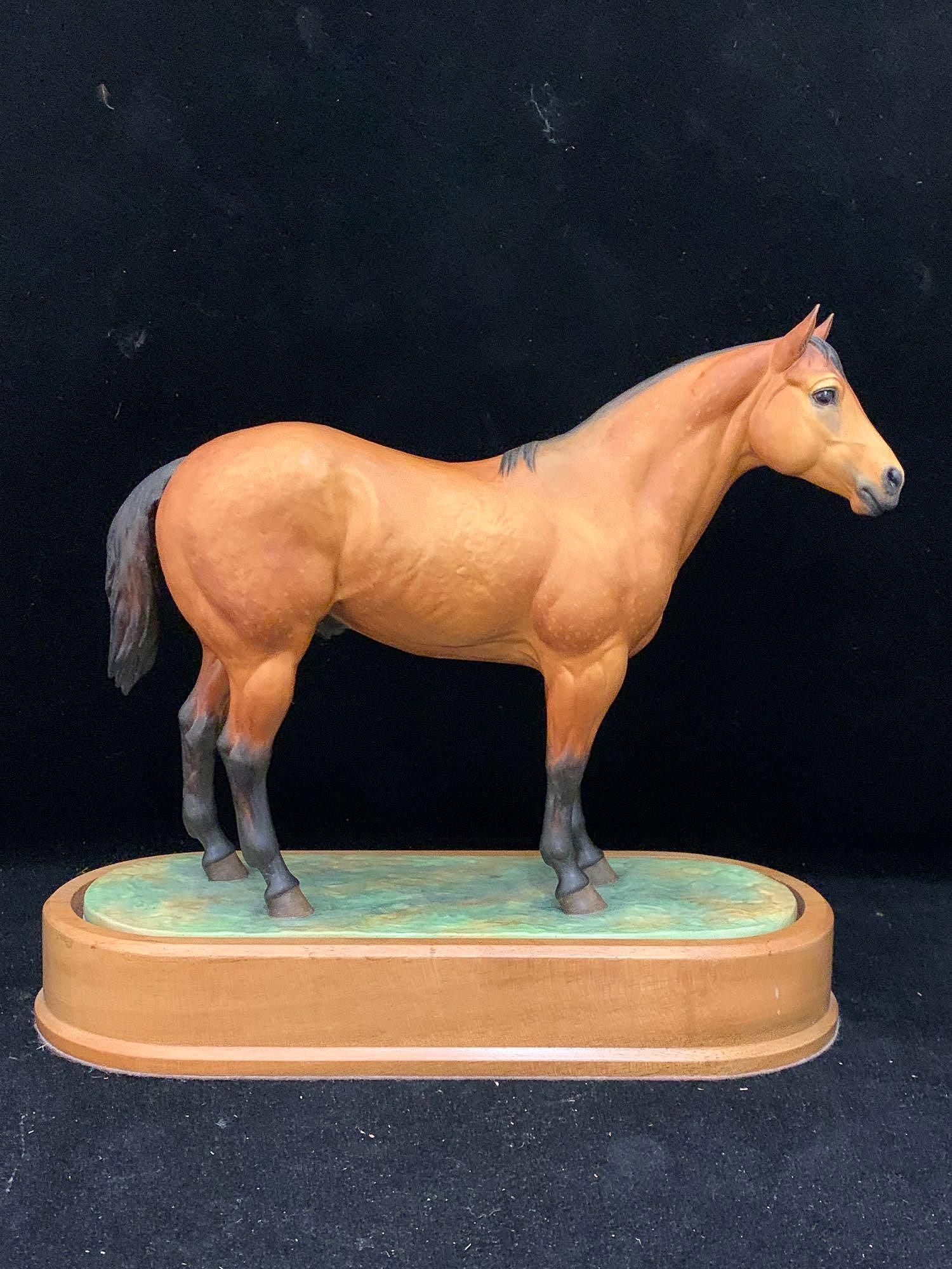 Royal Worcester Biqsue Quarter Horse: A Royal Worcester bisque figure of a quarter horse. 1962. Modeled by Doris Lindner. In a fitted wooden base. Dimensions excluding base: 8-1/2 in tall x 9-1/2 in wide x 3-1/2 in deep. Provenance: C. Th