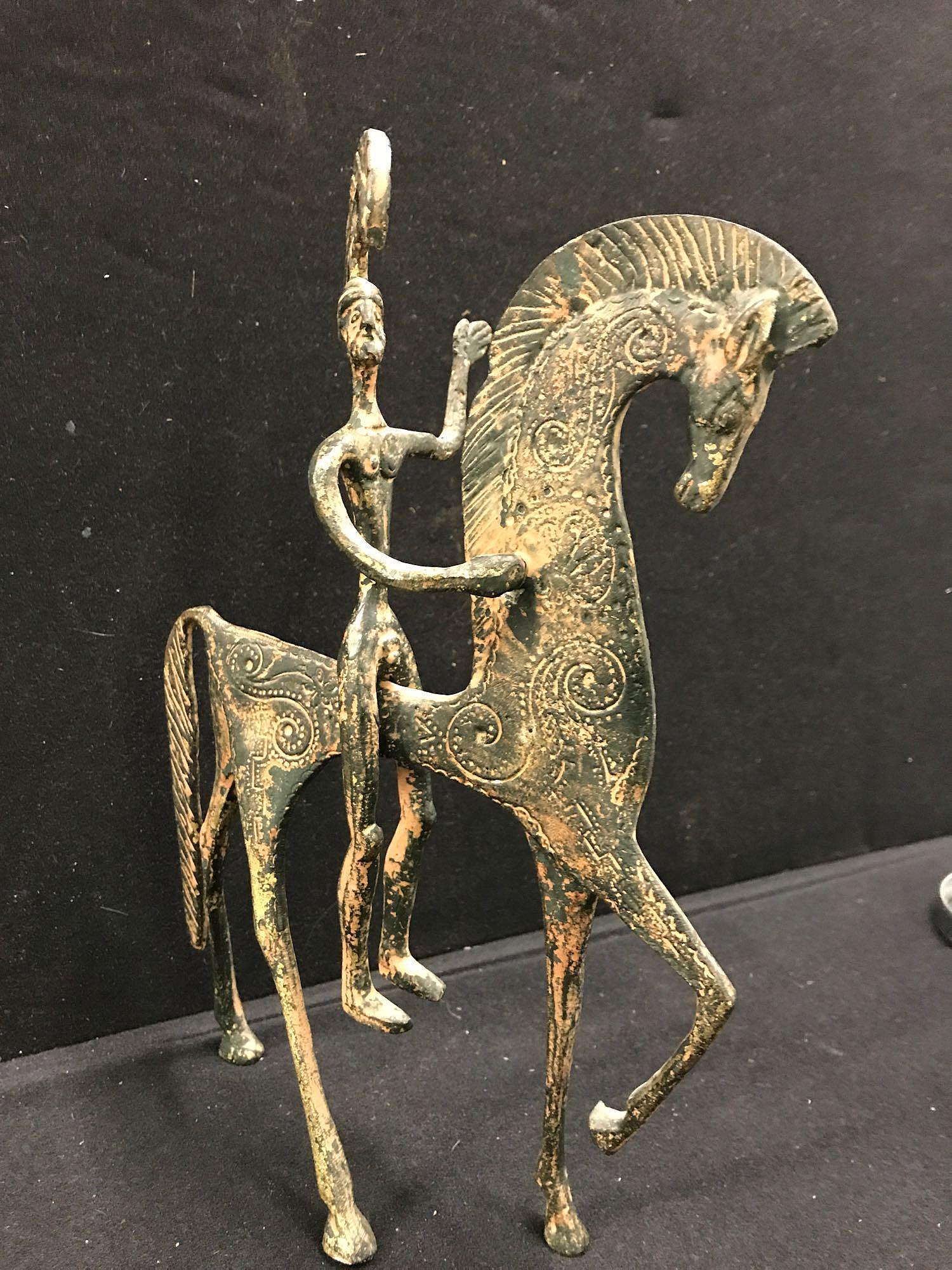Frederick Weinberg Style Roman Soldier on Horse: Frederick Weinberg style patinated Metal Roman soldier on stylized prancing horse, 11 1/4 in tall, Provenance: C. Thomas and Alexandra Fuller Estate Collection of Willow Brook Farms, Catasauqua, PA.