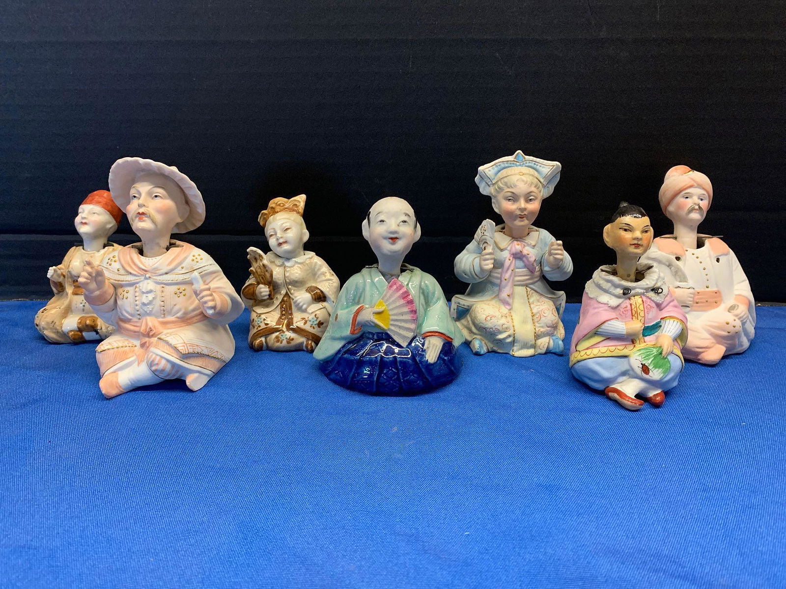 Seven Porcelain Nodder Figurines (1 of 5)