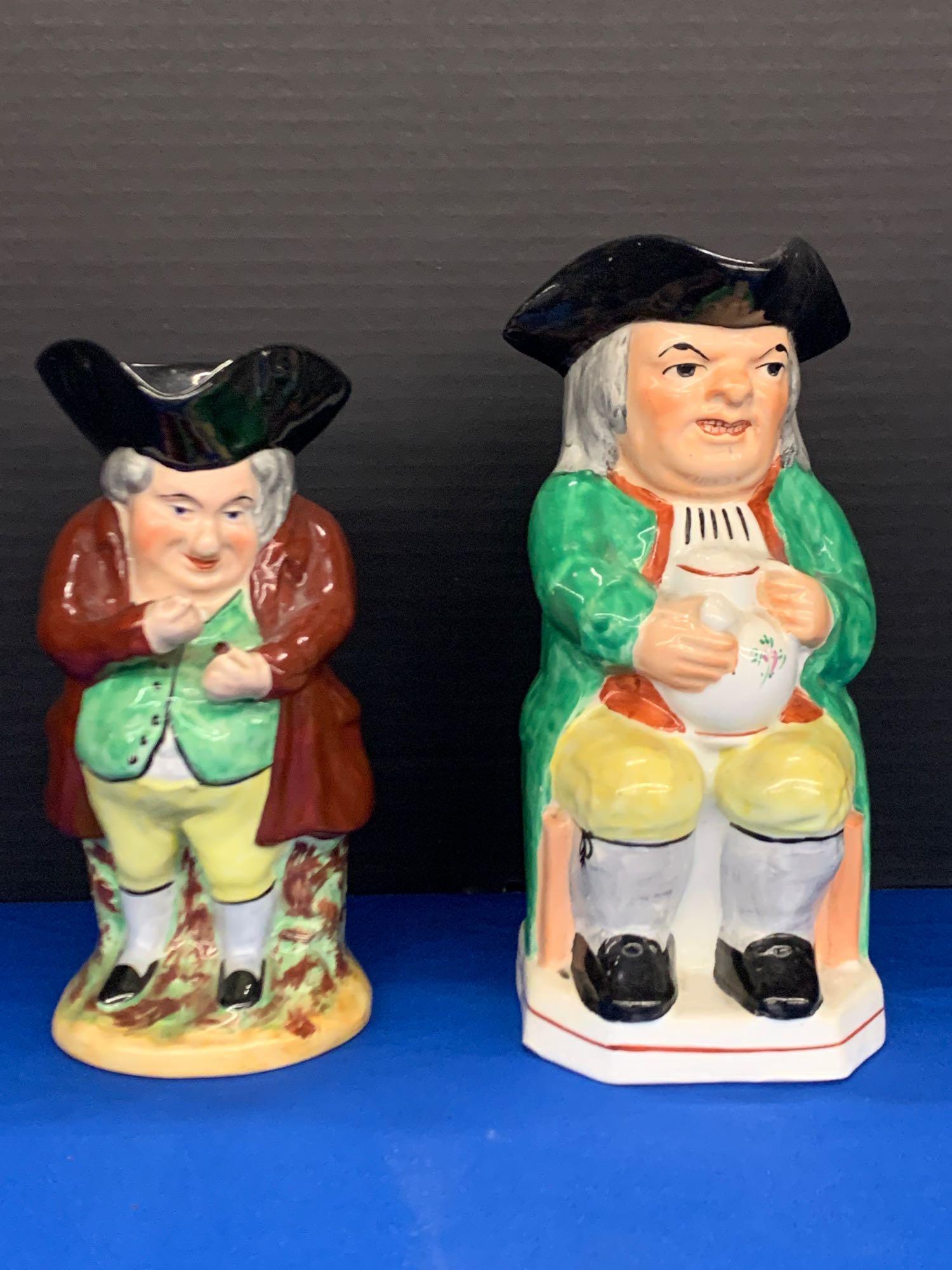 Two 19th C. Toby Pitchers: Two 19th C. Toby pitchers, both signed on base "Staffordshire Ware". 9-1/2in tall.