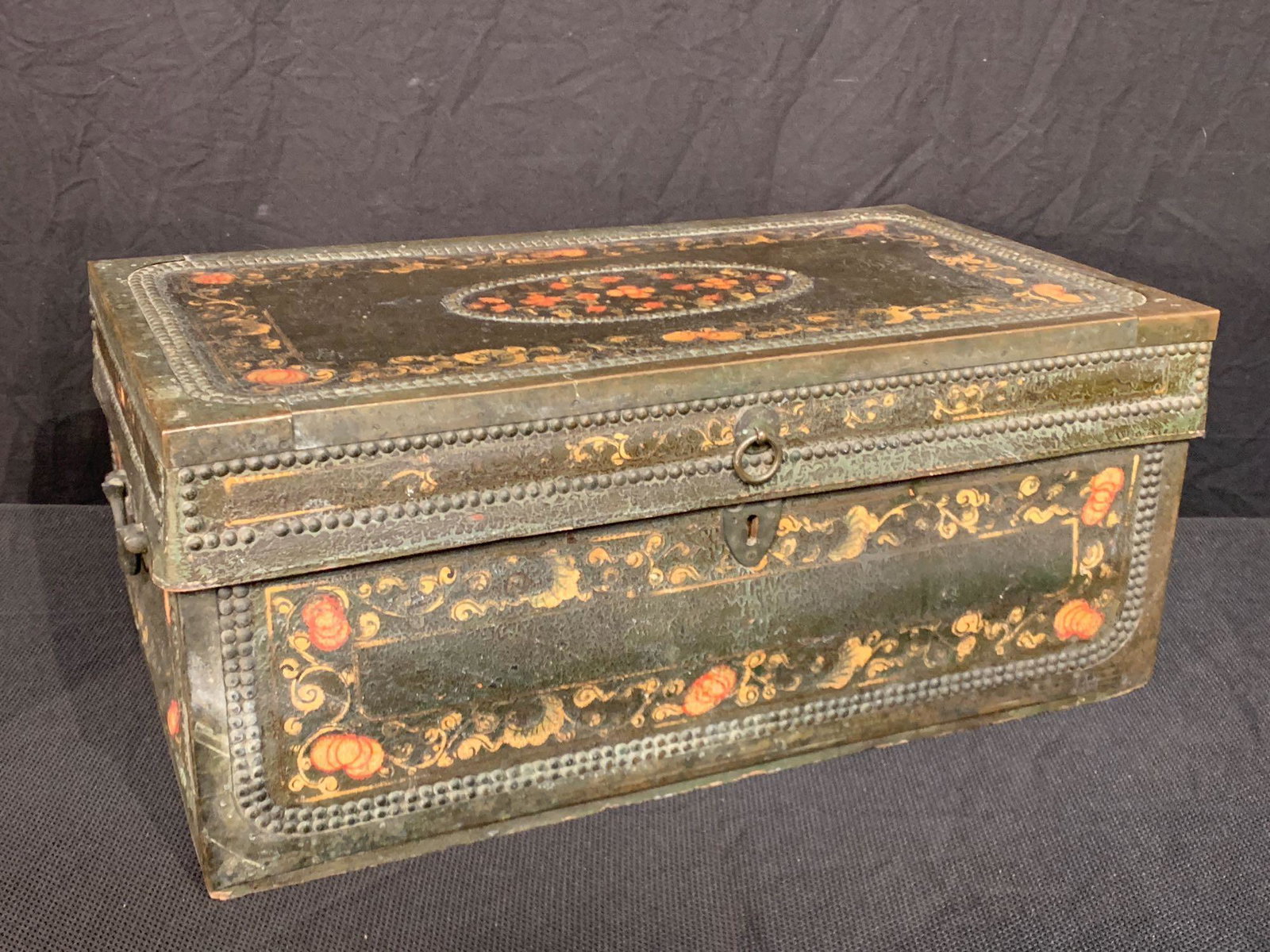 Chinese Export Painted-Leather Camphor Chest: A 19th C. Chinese export floral-painted and studded leather camphor chest. Diminutive size: 11in tall x 27in wide x 15in deep.