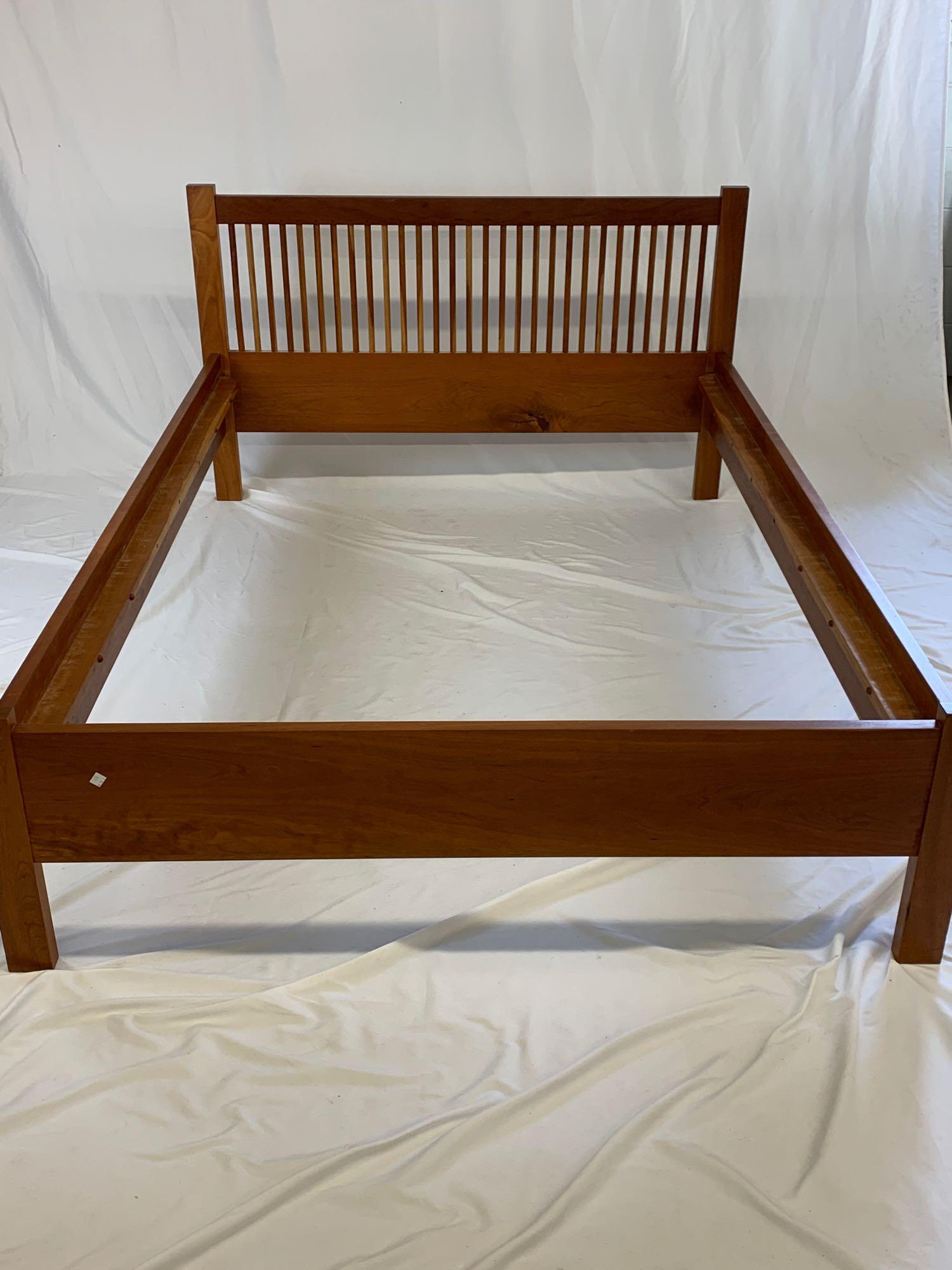 MT Maxwell Cherry Full Size Bed: A cherry full size bed by MT Maxwell having a spindle headboard. 34in tall x 57in wide x 78-1/4in long.