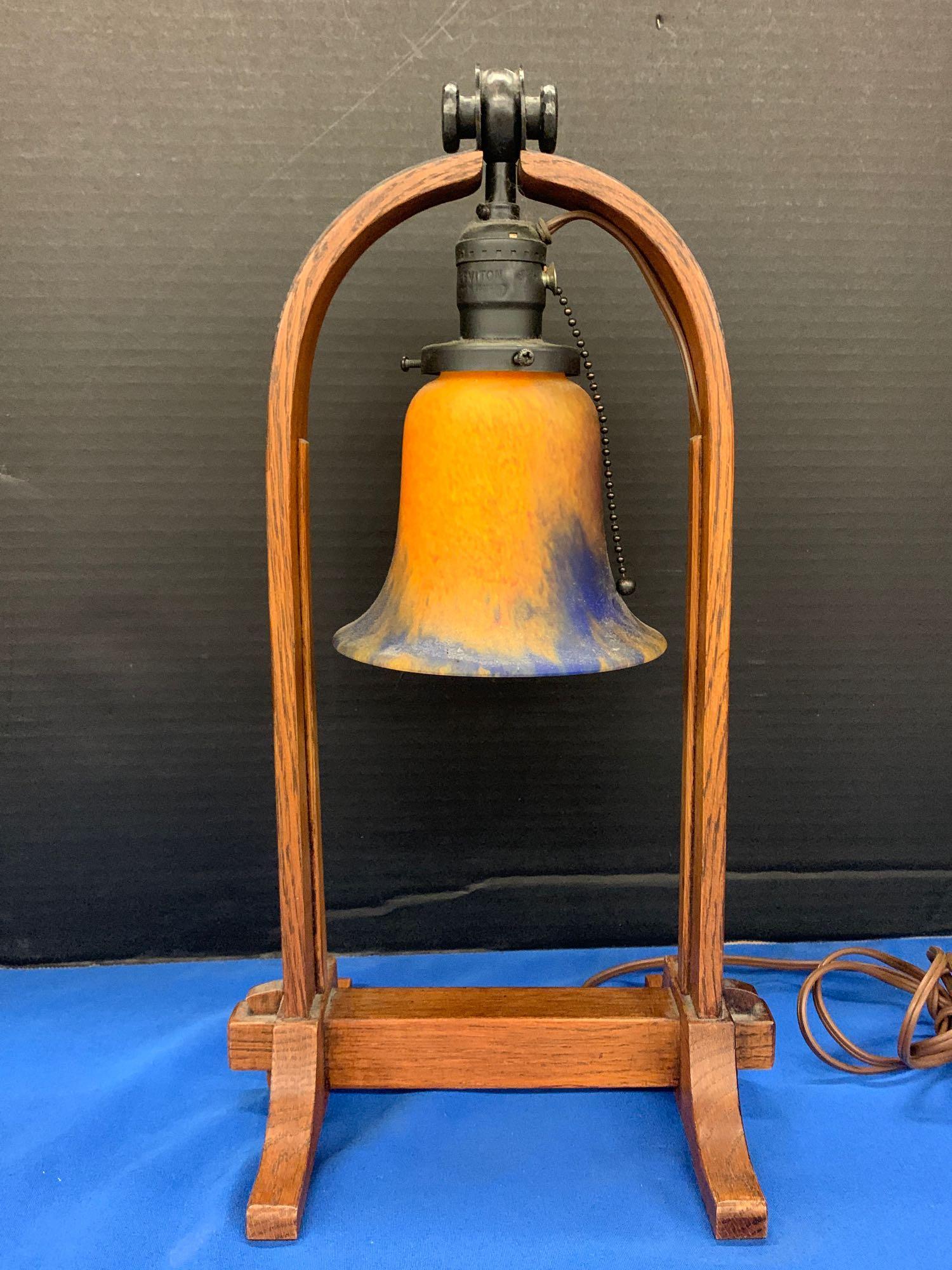 Contemporary Stickley Oak & Hammered Copper Lamp: A contemporary Stickley Arts & Crafts oak table lamp with hammered copper harp top and art glass shade. Branded mark. 16-1/2in tall x 9in wide x 7-1/4in deep.