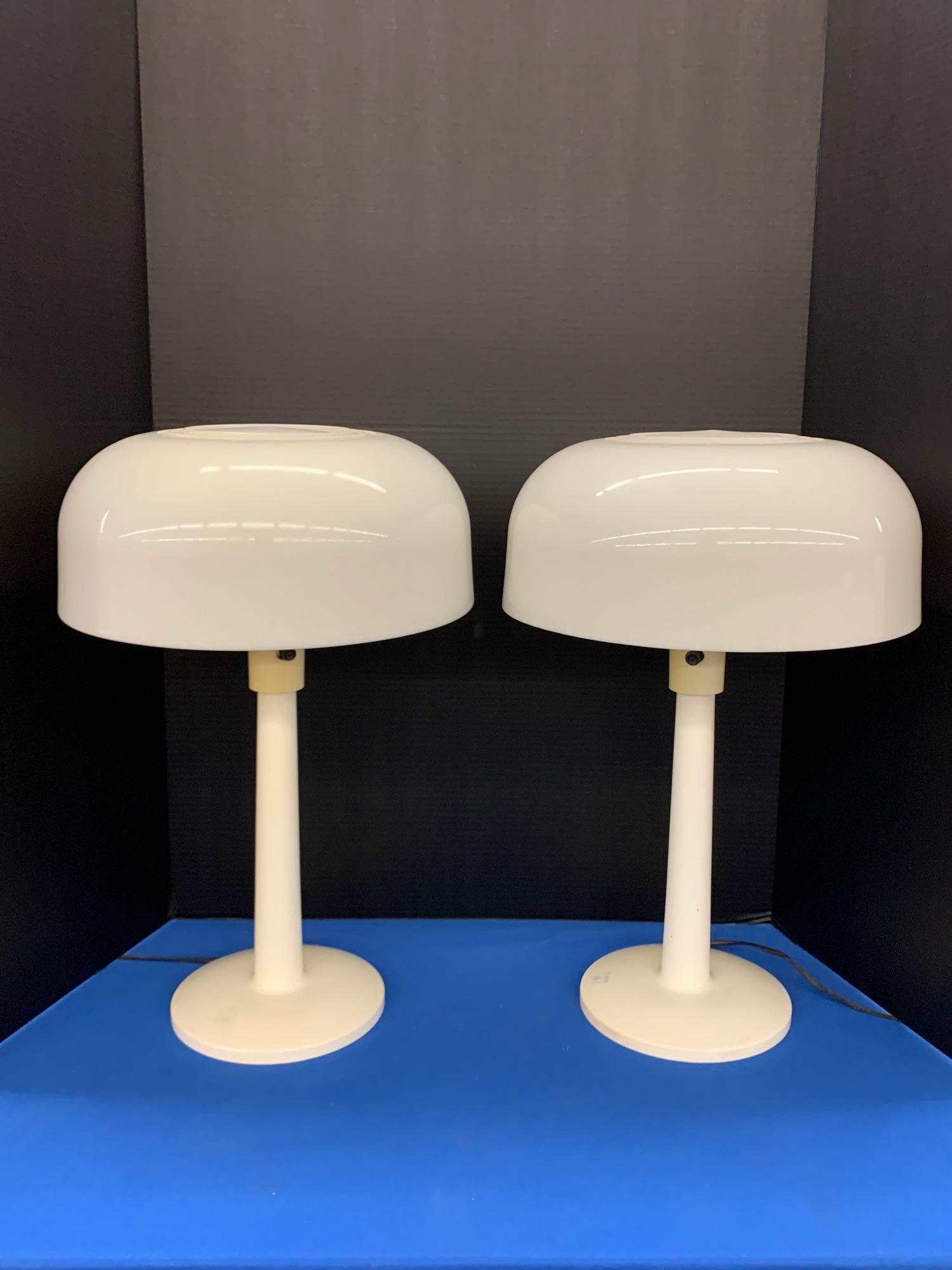 Pair of Lightolier Space Age Plastic Table Lamps: A pair of Gerald Thurston for Lightolier white plastic table lamps. Each is 19-1/2in tall x 12-3/4in diameter.