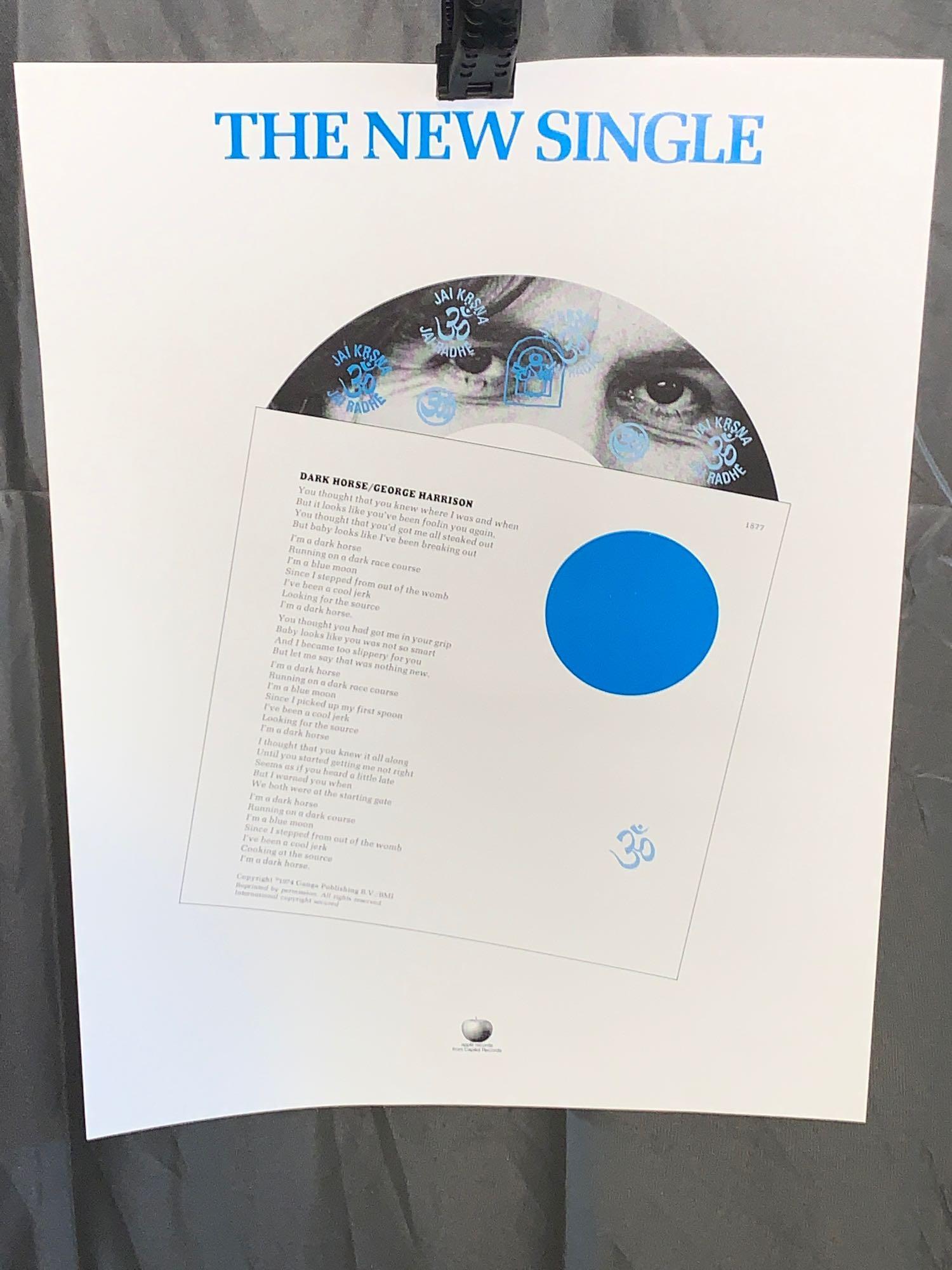 George Harrison Promotional Lyric Sheet: Apple label promotional lyric sheet for George Harrison's 45rpm single "Dark Horse". 15in x 11in.