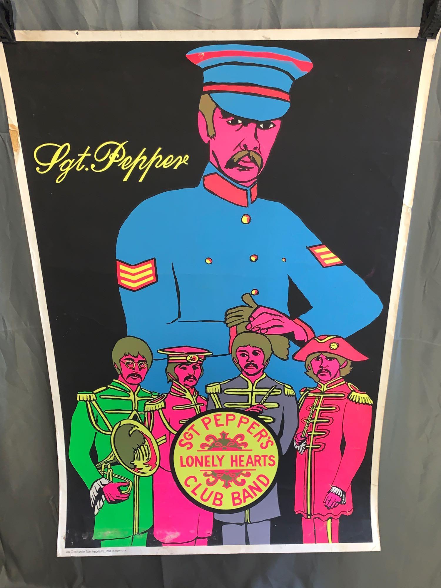 Original Beatles Sgt Pepper Black Light Poster: Original Beatles Sgt Pepper's Lonely Heart's Club Band black light poster dated 1967 distributed by Leslie Tobin Imports, Philadelphia. 35in x 23in.