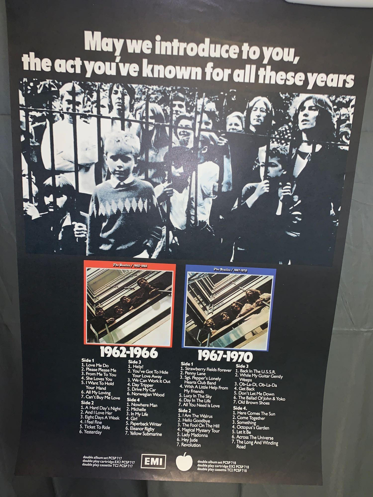 Beatles Red and Blue Albums Promotional Poster: EMI/Apple British promotional poster pushing the Beatles' "1962-1966" (Red) album and the "1967-1970" (Blue) album. 30in x 20in.