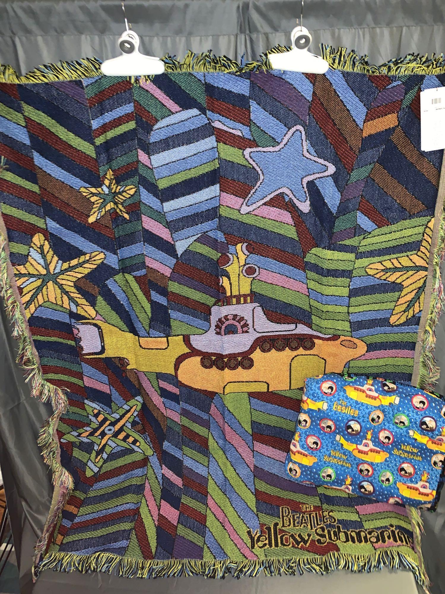Beatles Yellow Submarine Throw & Blanket-in-A-Bag: A Beatles "Yellow Submarine" throw and blanket-in-a-bag. Throw: 58in x 48in, with original tag and bag. Blanket: 70in x 42in.