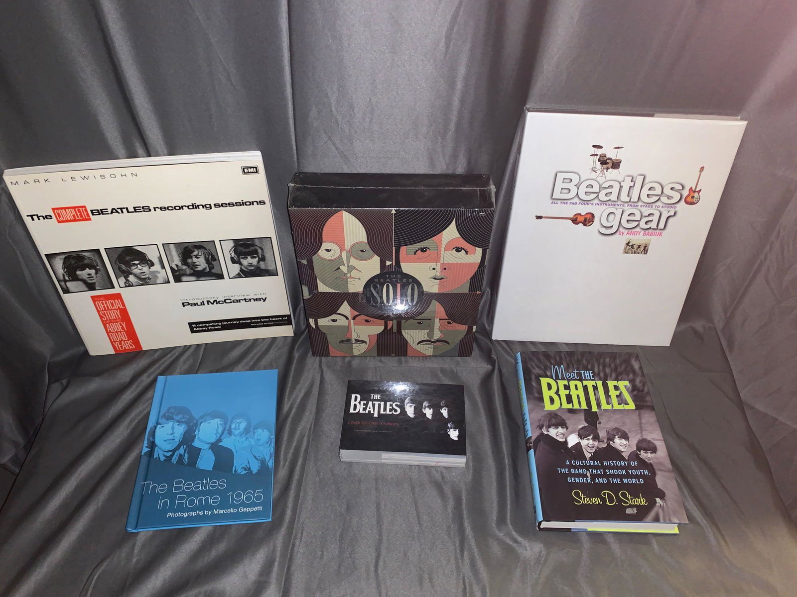 Six Beatles Books: A lot of six Beatles books including "The Complete Beatles Recording Sessions", "Solo" (set of 4 books in slip case sealed), "Beatles Gear" (sealed), "The Beatles in Rome 1965", "Meet the Beatles" (st