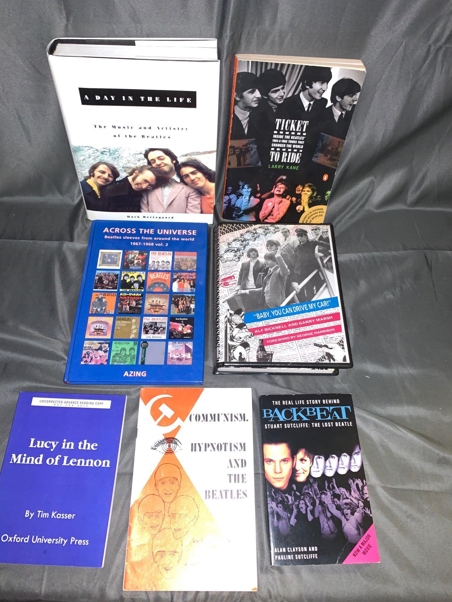 Seven Beatles-related Signed and Rare Books: A lot of seven Beatles-related signed and rare books including five signed by the author: "A Day in the Life" by Mark Hertsgaard, "Ticket to Ride" by Larry Kane, "Across the Universe" by Azing Moltmak