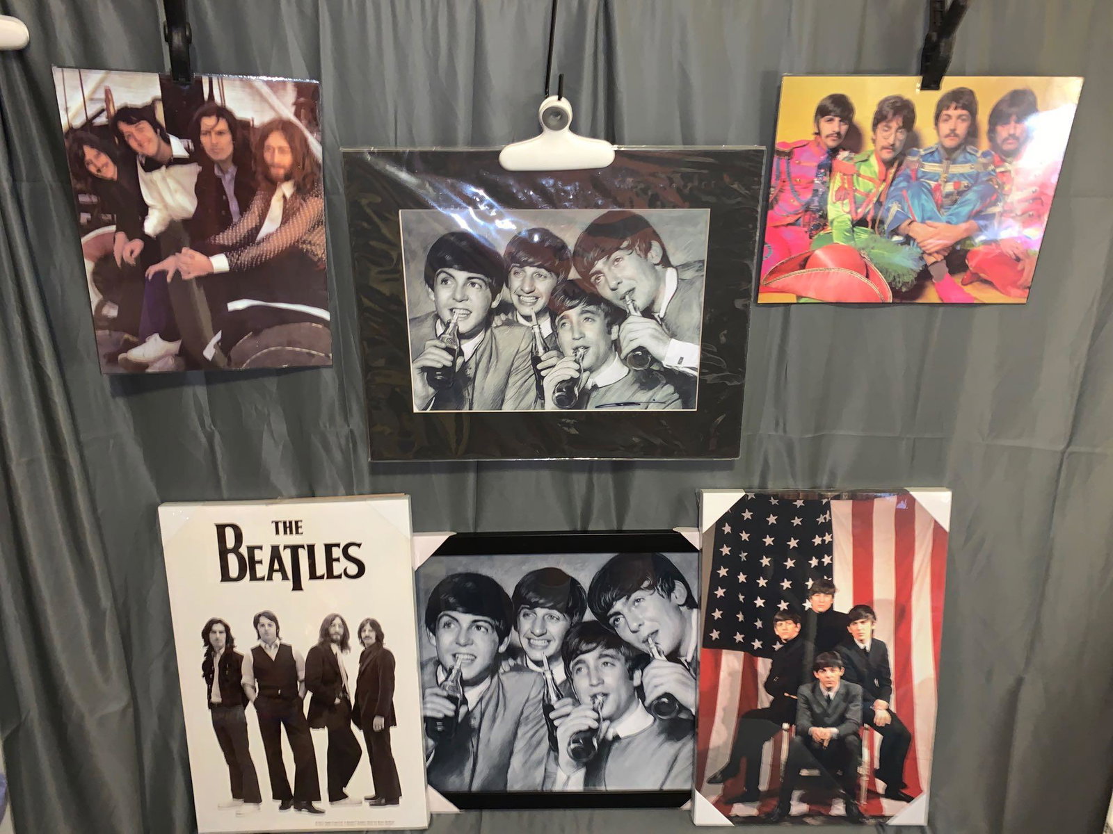 Six Beatles Prints: A lot of six Beatles prints, five unframed and one framed. The Beatles drinking Coke is present both framed and unframed but matted.