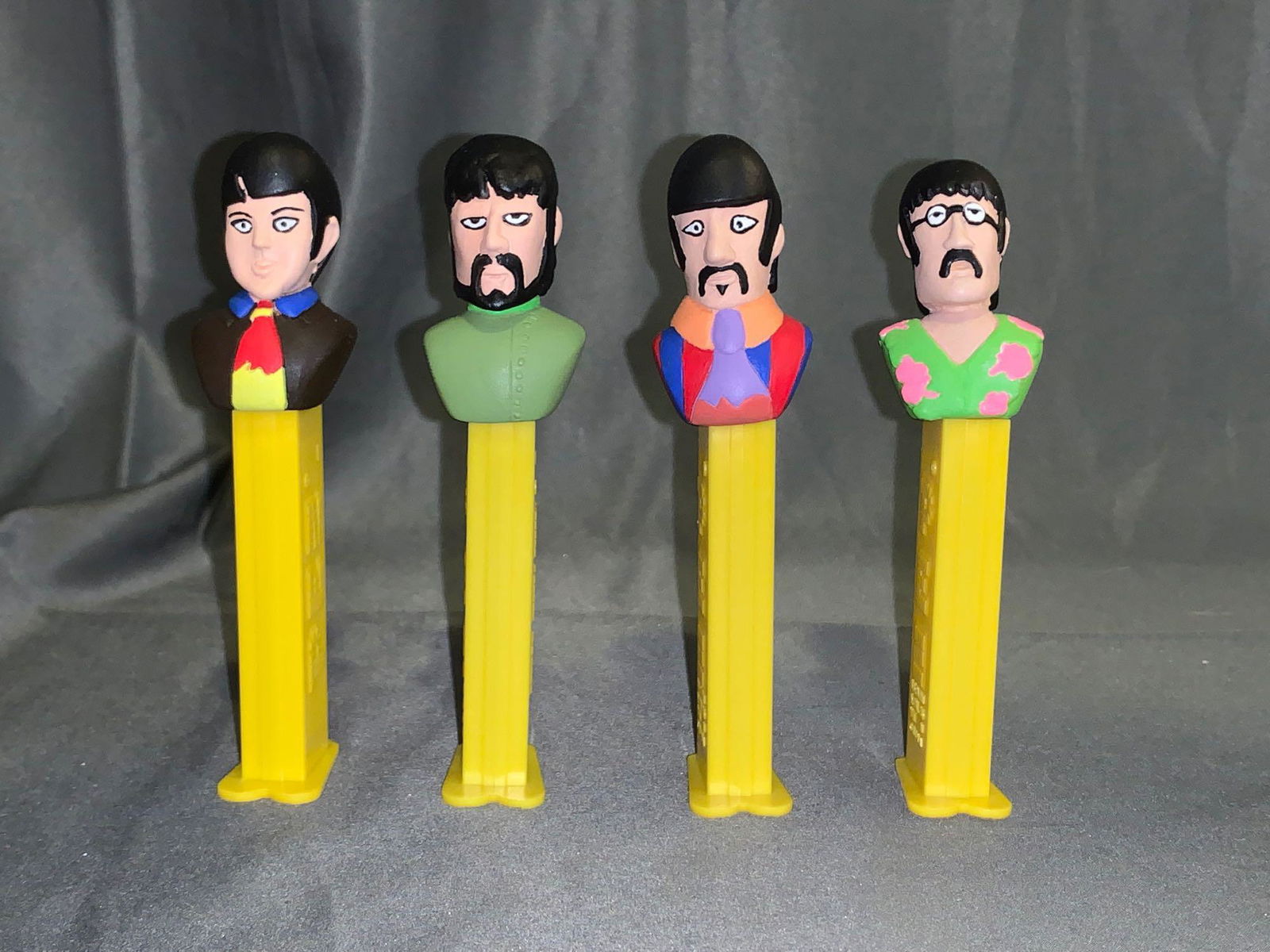 Four Beatles Yellow Submarine Pez Dispensers: A set of four Beatles Yellow Submarine Pez dispensers, each 4.75in tall.