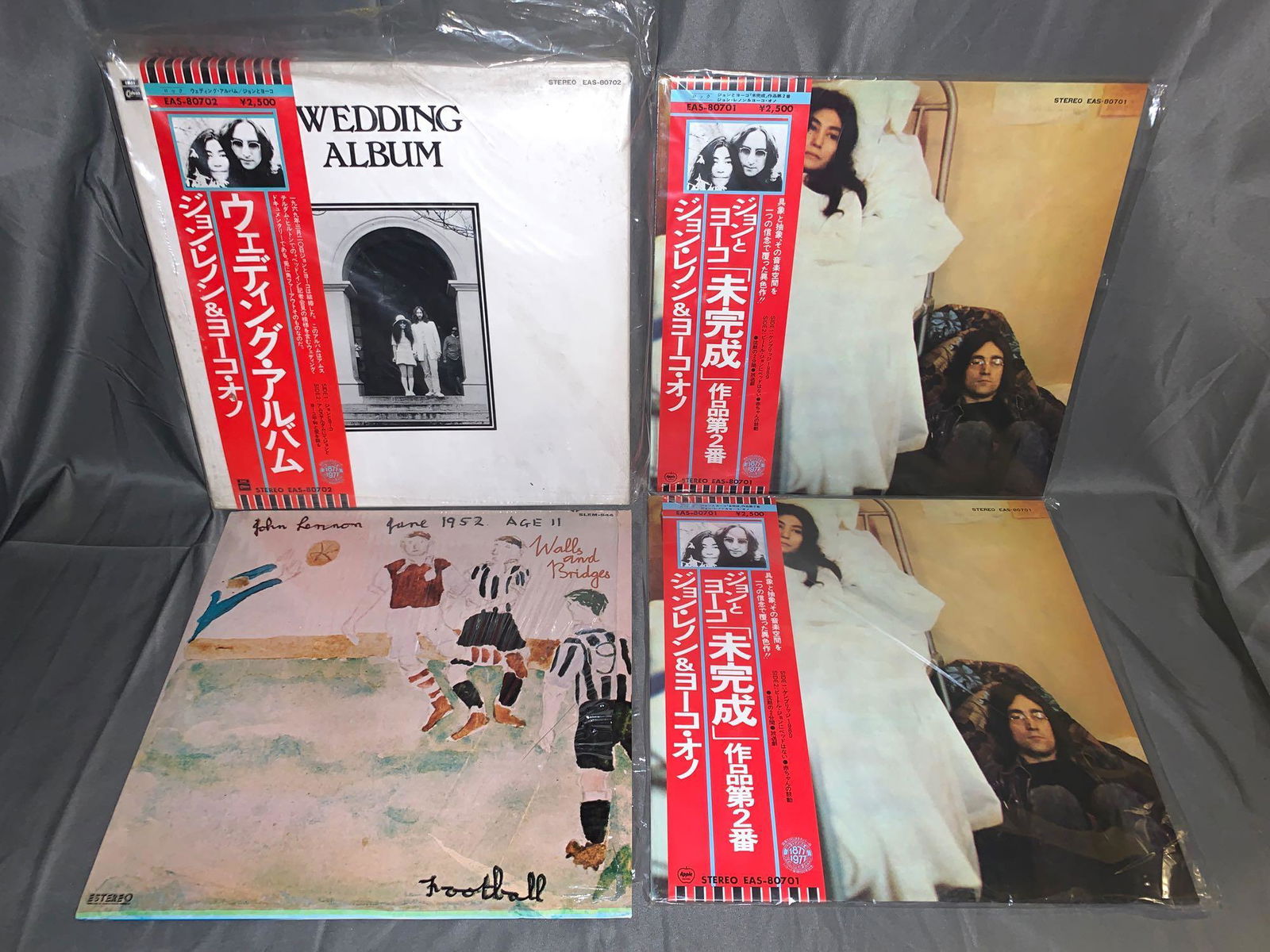 Four John Lennon 33rpm Non-U.S. Pressings: A lot of four John Lennon 33rpm non-U.S. pressings including the "Wedding Album" (VG+/VG+), two copies of "Unfinished Music No.2: Life With the Lions" (both VG+/VG+) and a Mexican pressing of "Walls a