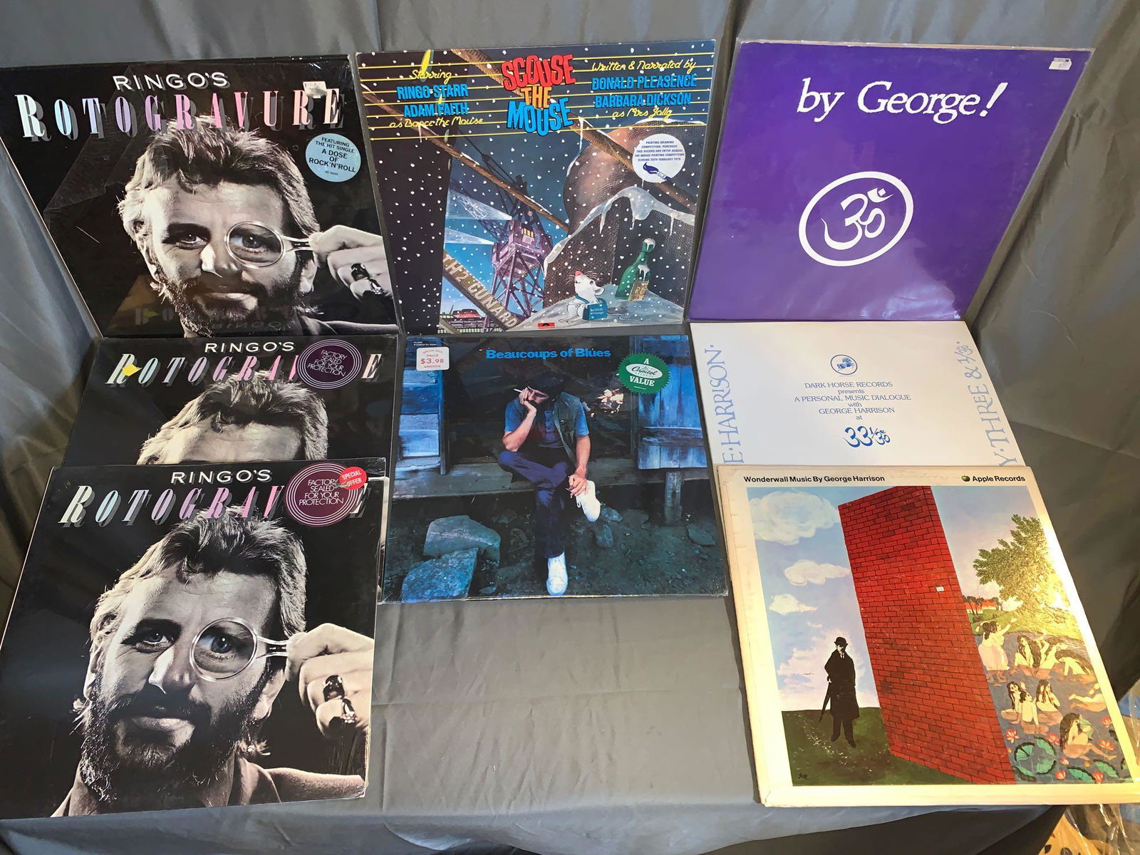 8 33rpm Records by Ringo Starr & George Harrison: A lot of eight 33rpm records by Ringo Starr and George Harrison, including "Scouse the Mouse" with insert (VG+/VG+), three sealed copies of "Ringo's Rotogravure", a sealed copy of Ringo Starr's "Beauc
