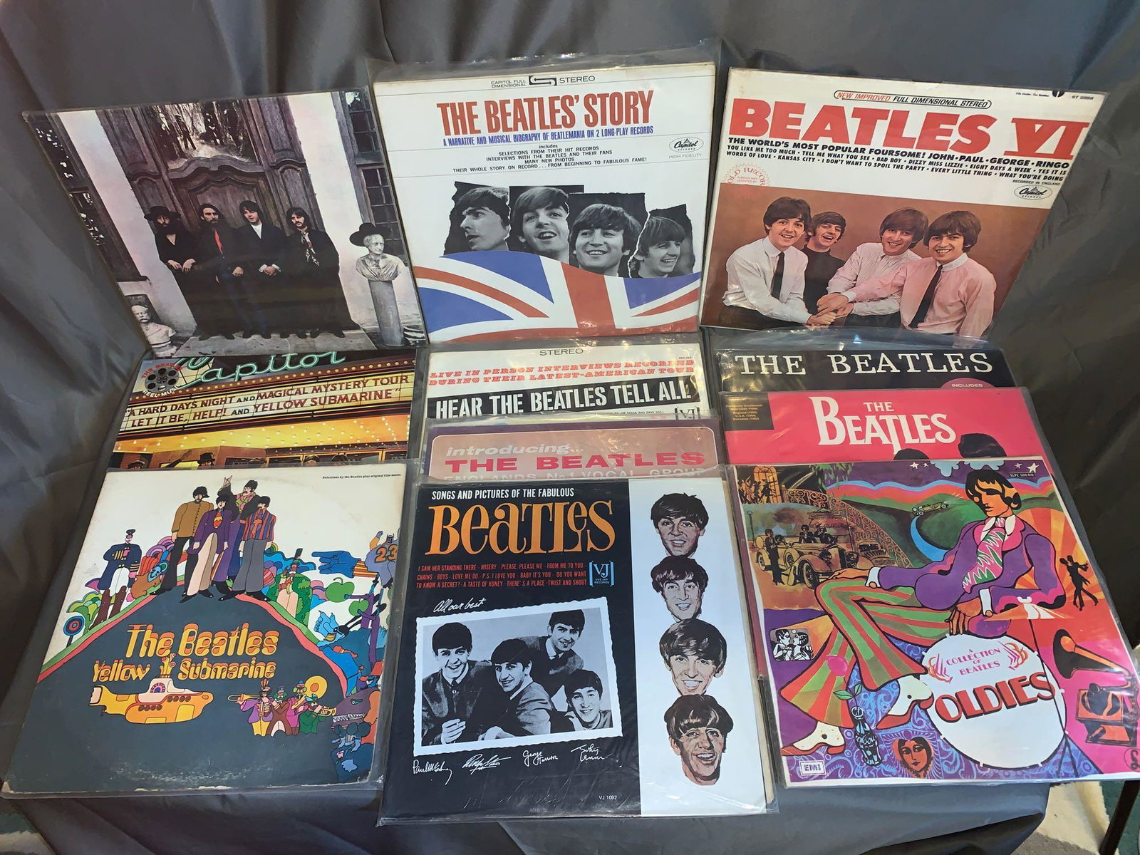 Eleven Beatles 33rpm Albums: A lot of eleven Beatles 33rpm albums, including four albums on the Apple label, but with Capitol jackets, three albums on the Vee Jay label that are reissues, an EMI Uruguay pressing of "A Collection 