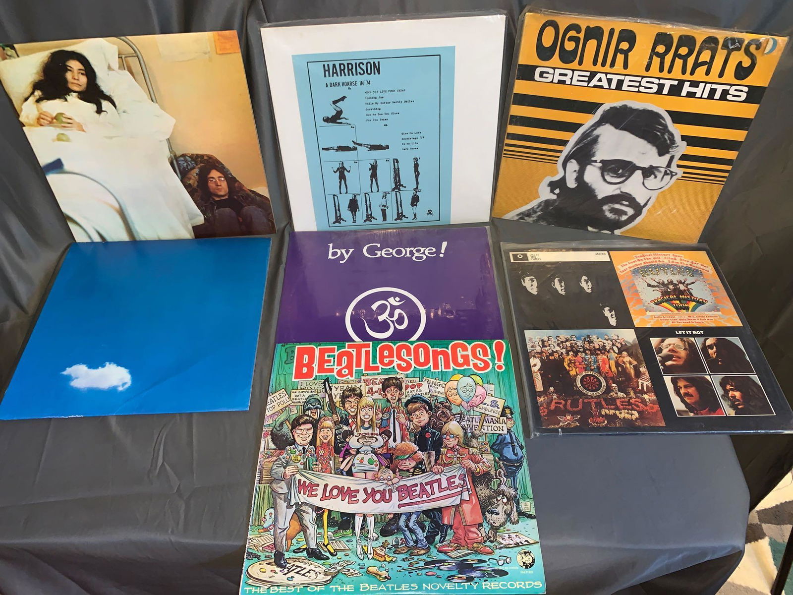 Seven Beatles-related 33rpm Records: A lot of seven Beatles-related 33rpm records, including a near mint copy of John Lennon/Yoko Ono's "Unfinished Music No. 2: Life With The Lions", a Very Good+ condition "Live Peace From Toronto", Geor