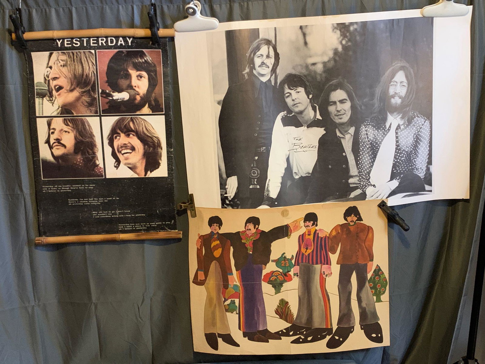 Three Beatles Posters: A lot of three Beatles posters including a black & white portrait poster (34.5in x 22.5in, some creasing and minor damage); a Yellow Submarine poster that came from "Eye" Magazine (25in x 19.5in, has