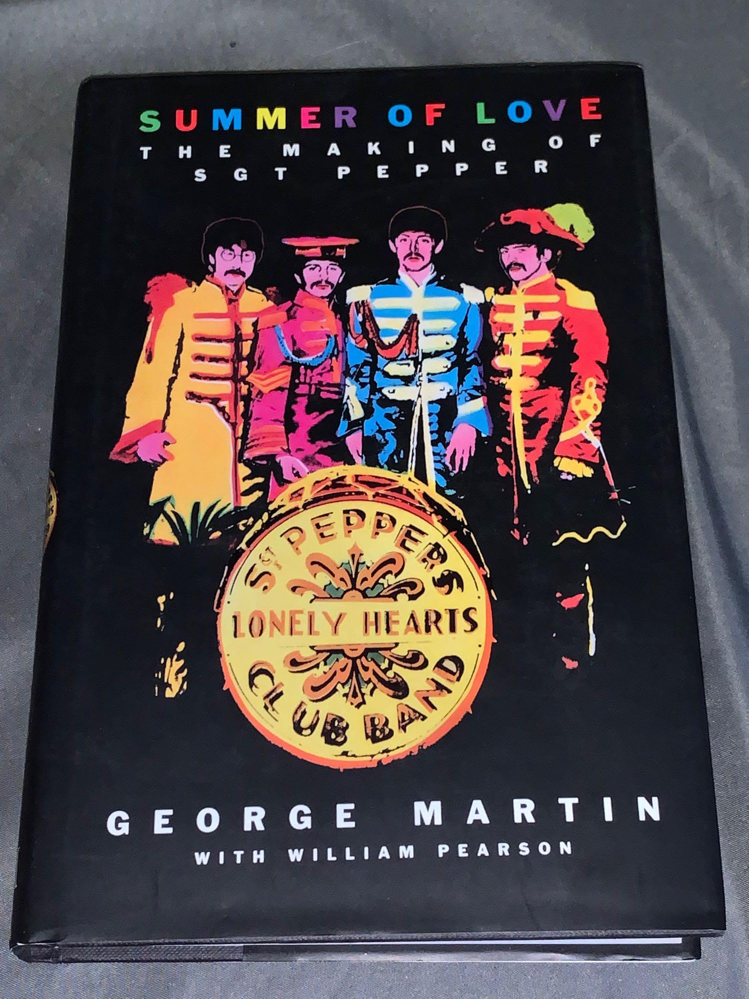 Book Signed by George Martin: "Summer of Love" Signed by the author George Martin. George Martin also produced many of The Beatles original albums and was a talented musician in his own right.