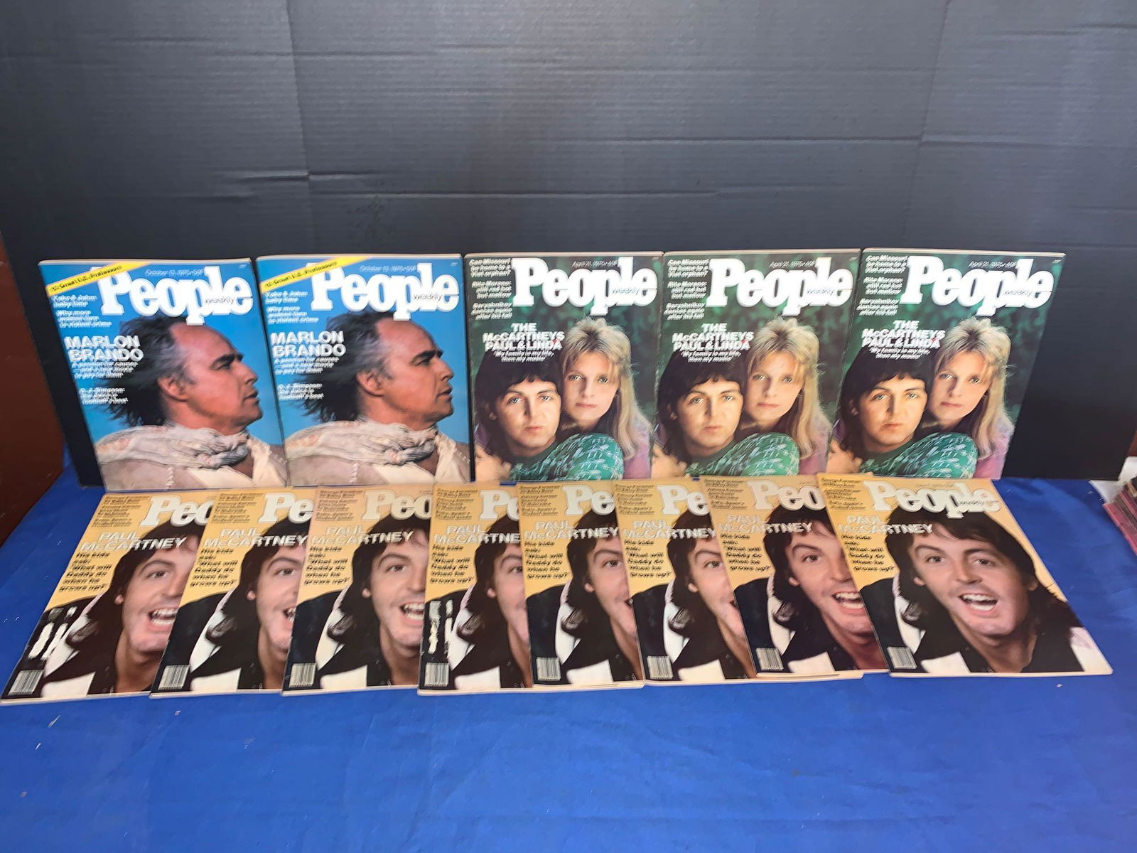 13 People Magazines, Beatle-related: A lot of 13 Issues of Beatle-related People magazine. Two issues with Marlon Brando on the cover have articles about John Lennon, the balance have Paul McCartney on the cover.