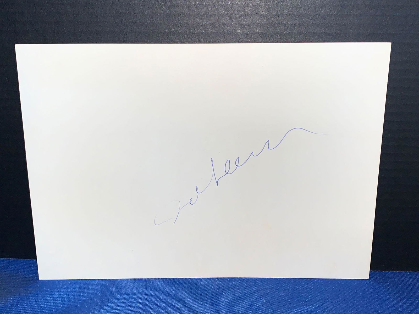 Signed John Lennon photo: A signed John Lennon photo, signed on the back of the John Lennon "photo" insert from The Beatles "White Album".