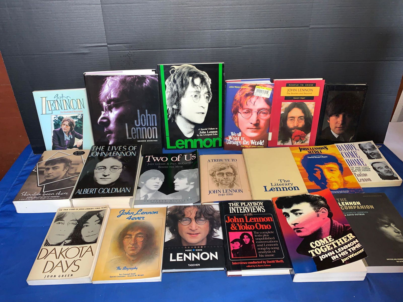 19 Books About John Lennon, Some First Editions: A lot of 19 books about John Lennon, some first editions, including "Dakota Days"; "The Lives of John Lennon"; "John Lennon 4ever"; "Two of Us", and five or six more. Also included is "Shoulda Been Th