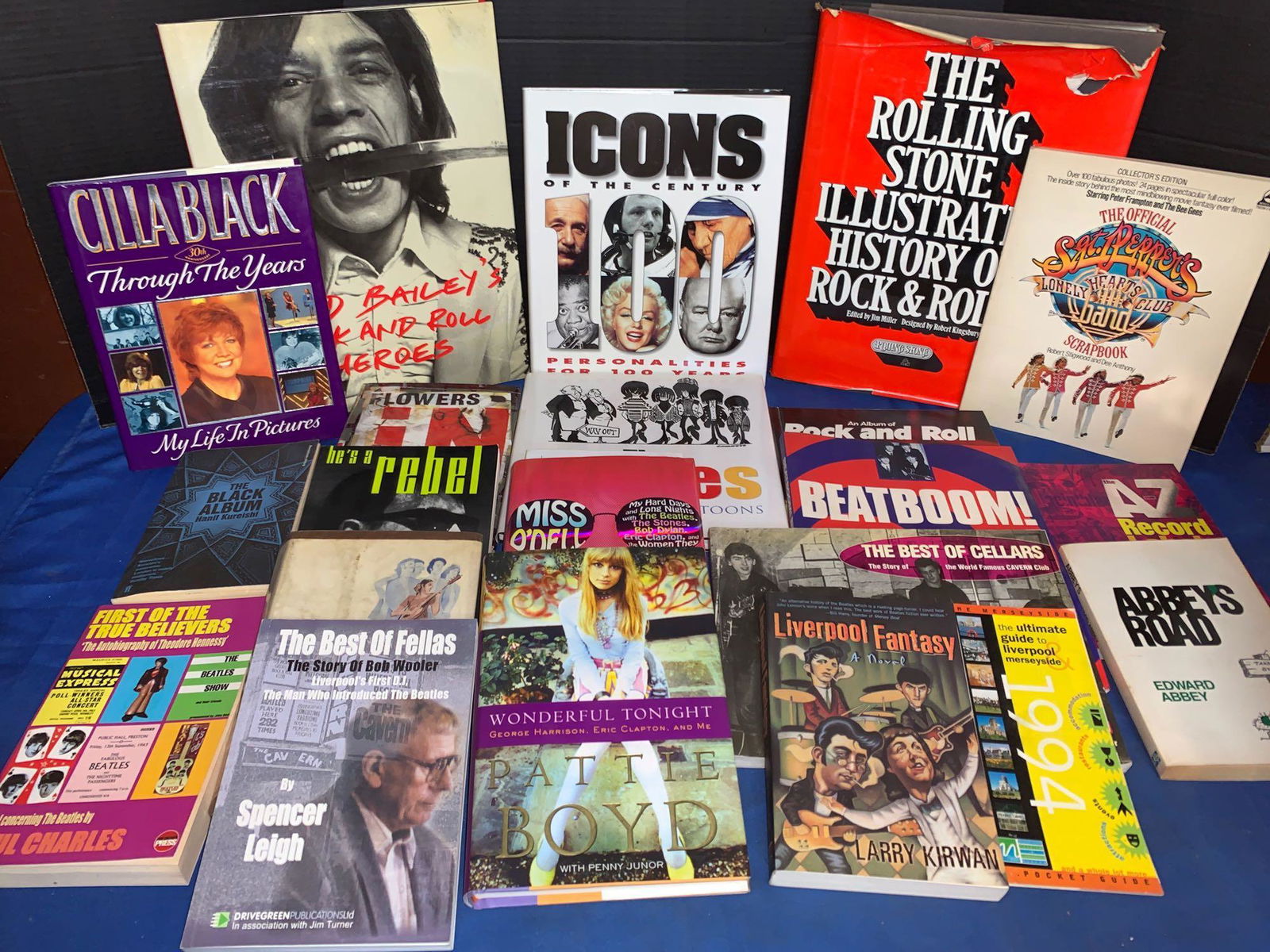 21 Rock & Roll-related Books, Some First Editions: A lot of 21 rock & roll-related books, including some first editions, and some with press releases. Included in the first editions are "The Rolling Stone Illustrated History of Rock & Roll", "Wonderfu