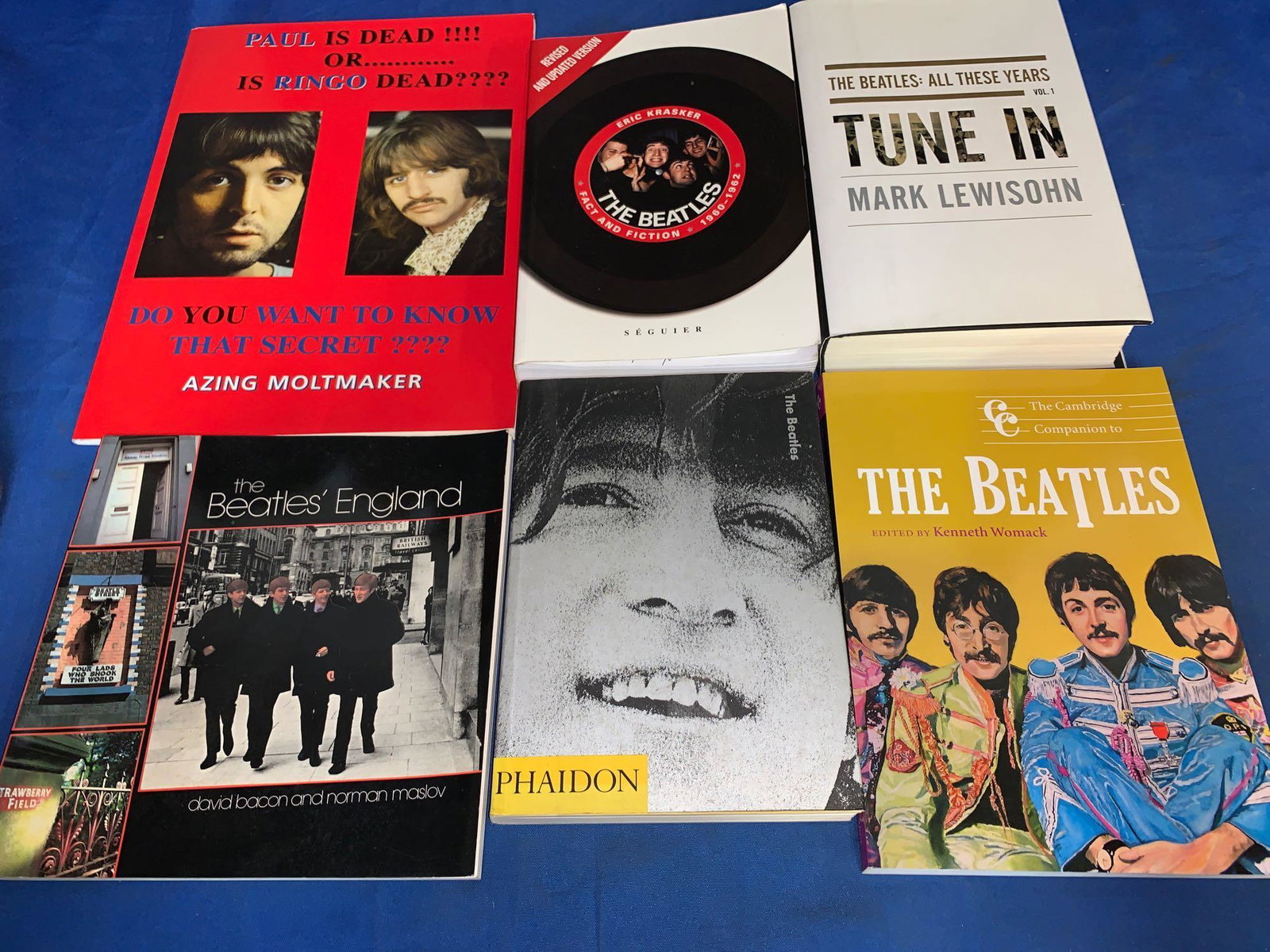 Six Beatles Books Signed by the Authors: A lot of six Beatles books signed by the authors, including "Paul Is Dead!!!! Or........Is Ringo Dead????" By Azing Moltmaker; "The Beatles Fact and Fiction" by Eric Krasker; "Tune In" by Mark Lewisoh