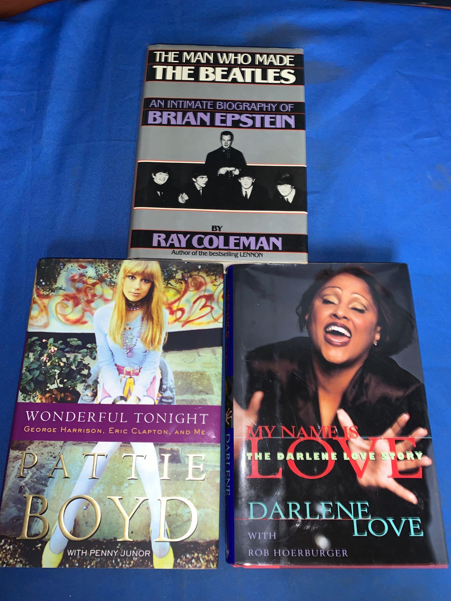 Three Books Signed by the Authors: A lot of three books signed by the authors, including "The Man Who Made The Beatles" by Ray Coleman, "Wonderful Tonight" by Pattie Boyd and "My Name Is Love" by Darlene Love.