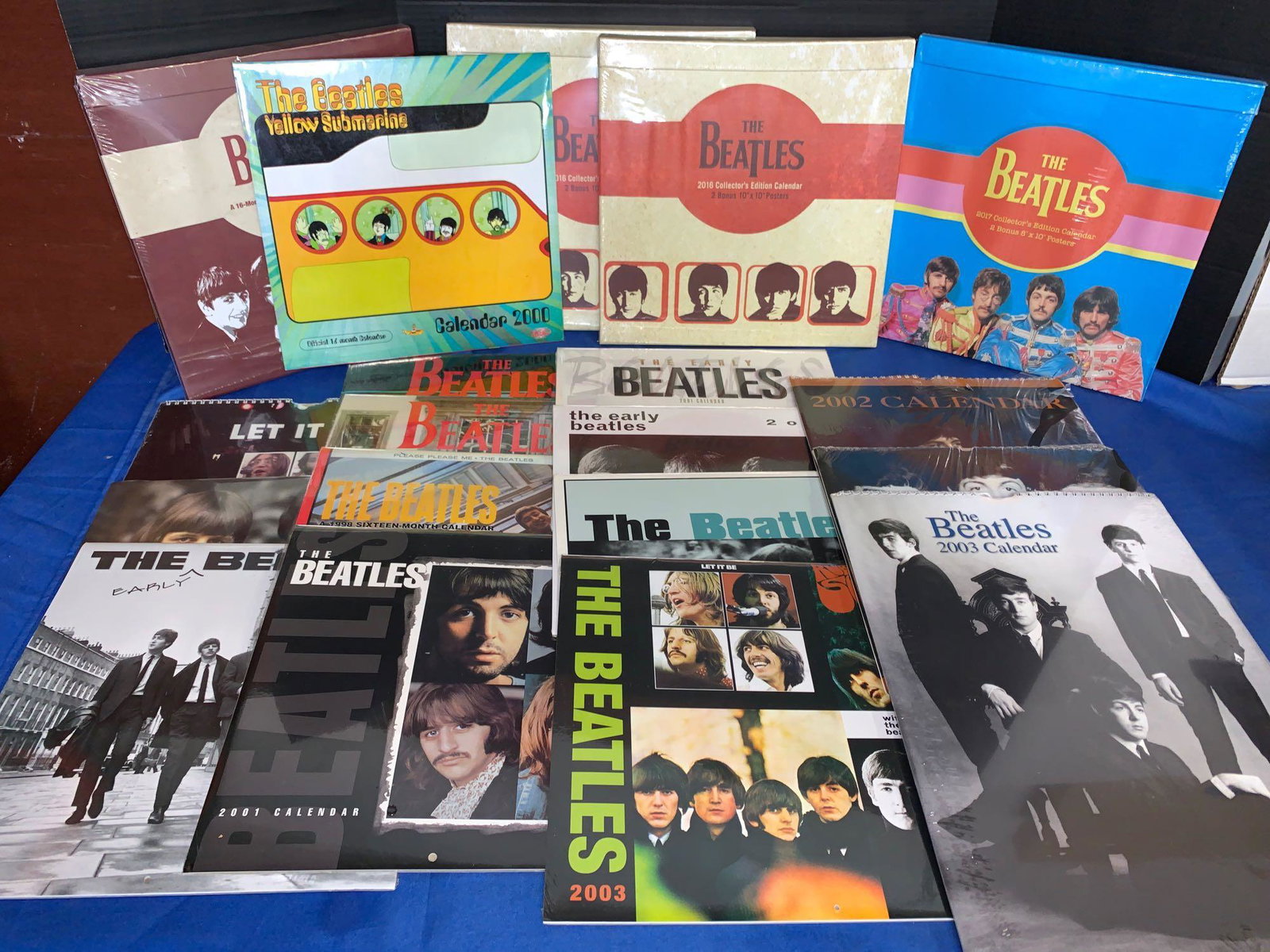 19 Unopened Beatles Calendars: A lot of 19 unopened Beatles calendars, mostly 1990s to early 2000s.