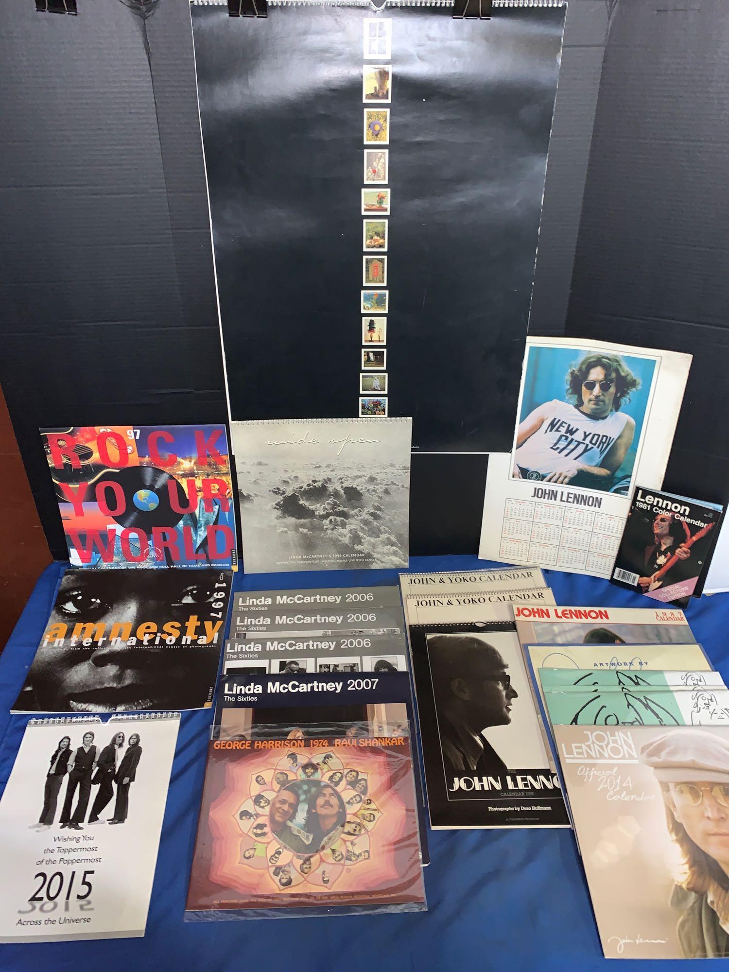 21 Beatles-related Calendars: A lot of 21 Beatles-related calendars including two 1970 John & Yoko calendars, a 1974 George Harrison/Ravi Shankar calendar, a 1986 John Lennon calendar with photos by Dezo Hoffman, a large 1989 Lind