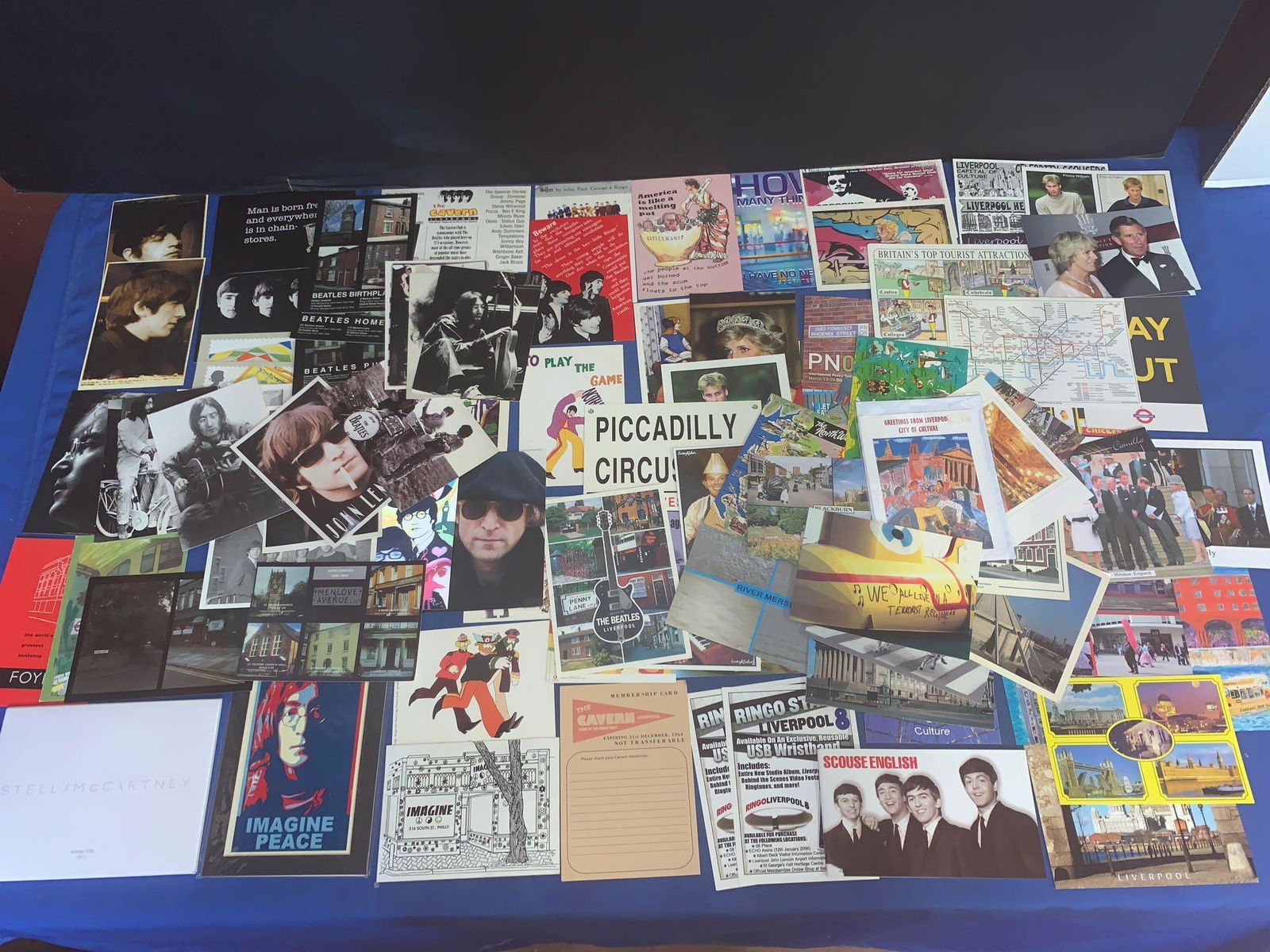 Mixture of Beatles and non-Beatle Postcards: A lot of Beatles and non-Beatle postcards including many about Liverpool, the Royal Family and many Beatles. Also included is a Stella McCartney fashion postcard book for 2012.