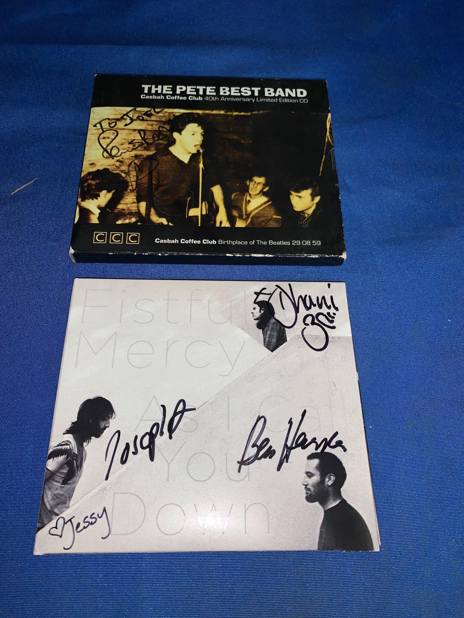 Two Autographed CDs: Pete Best, Ben Harper: A lot of two autographed CDs: one signed by Pete Best of the Pete Best Band and the Silver Beatles and one signed by the band Fistful of Mercy including Ben Harper, Joseph Arthur, Dhani Harrison (son