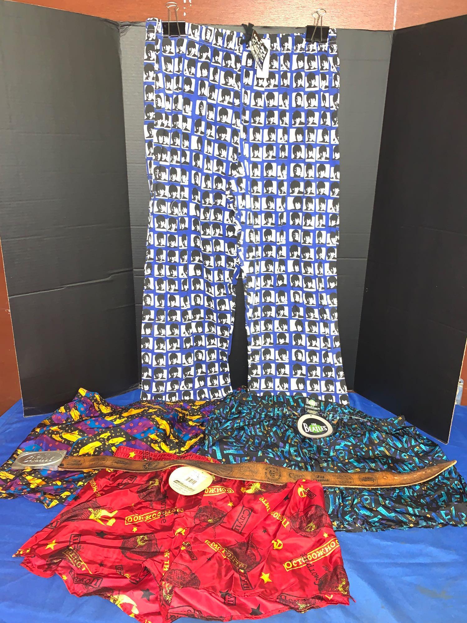 Beatles Boxers, Pajama Bottoms & Capitol Belt: Lot to include three Beatles boxer shorts (Yellow Submarine, Help! and Back in the USSR); Beatles pajama bottoms; and Capitol limited edition belt buckle and tooled leather belt #60/1000.