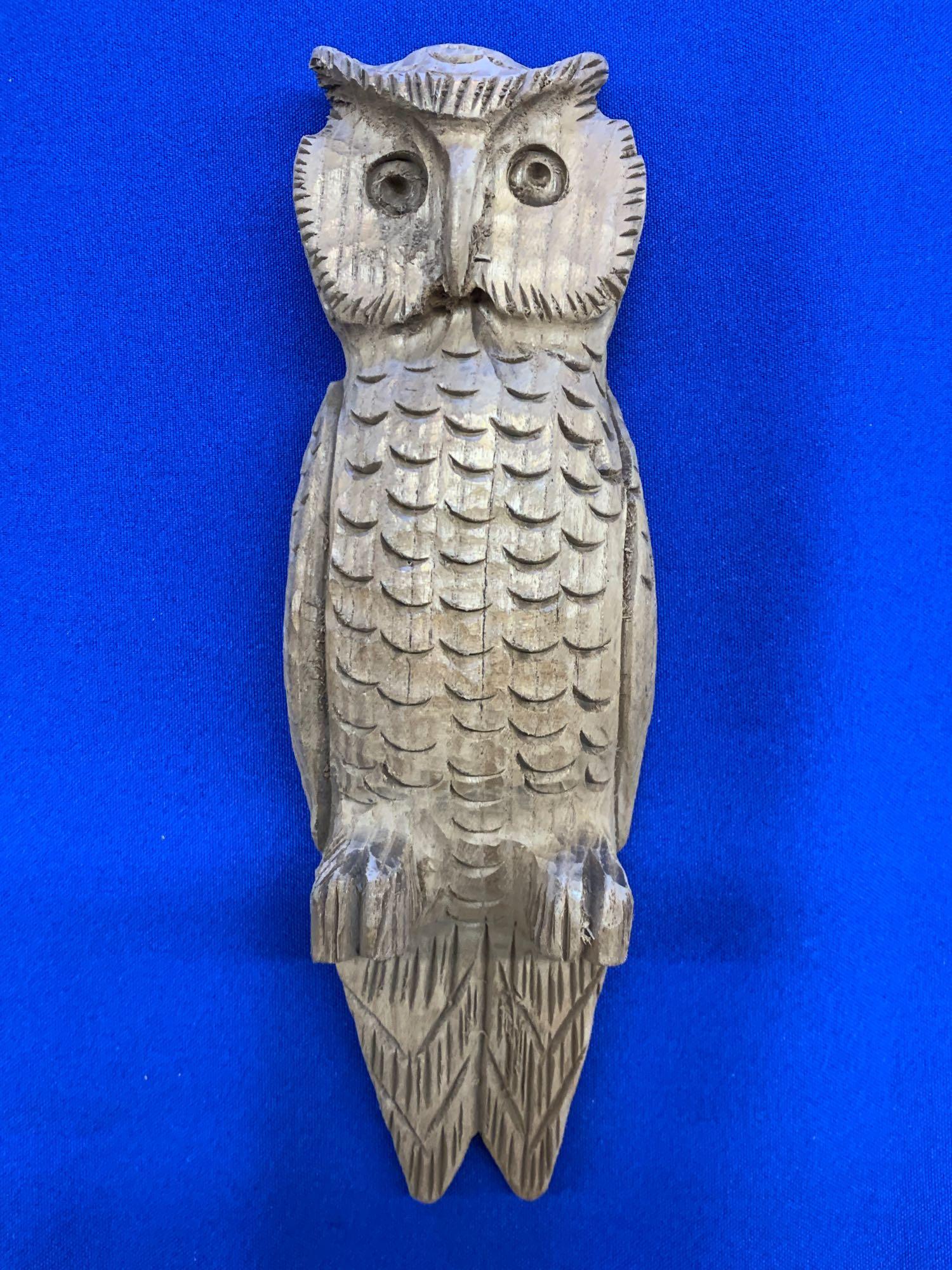 Clarence Stringfield. Carved Wooden Owl: Clarence Stringfield (Tennessee, 1903-1976). A folk art carved wooden owl, fixed for wall hanging, and signed verso. 9-1/2in x 3-3/4in.