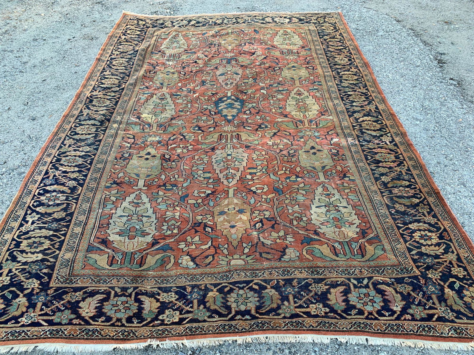Mahal Room-size Carpet. 12ft 2in x 8ft 6in: A Mahal room-size carpet with a rust background and blue border. 12ft 2in x 8ft 6in.