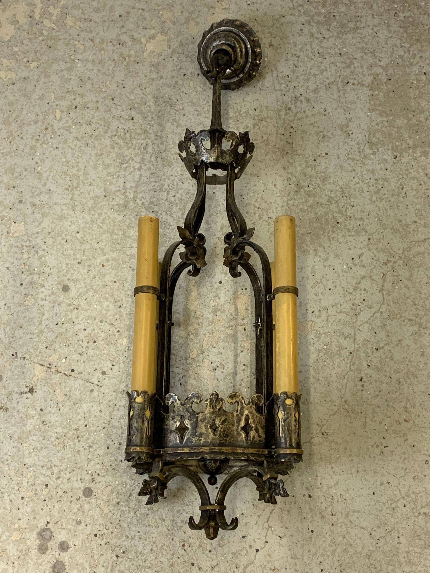 Gothic-style Hanging Chandelier: A Gothic-style hanging chandelier of pierced and scrollwork form with four lights. 34 in tall x 9-1/2 in diameter. Provenance: From a Karcher and Livingston-designed Haverford, PA home, circa 1929.