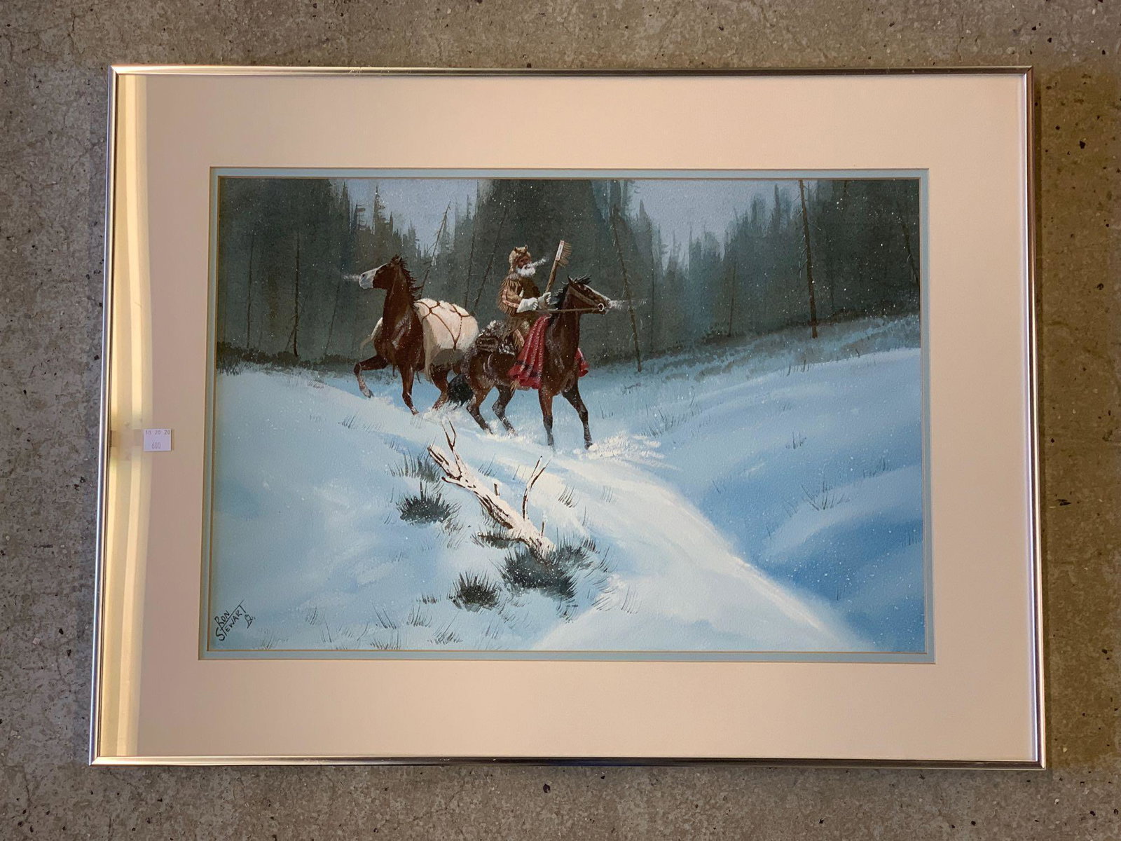 Ron Stewart. Watercolor, Native American in Winter: Ron Stewart (American, 20th Century). A watercolor on paper depicting a Native American on horseback in a winter landscape. Signed lower left. Framed under glass. Mat opening: 13-3/4 in x 20-3/4 in.