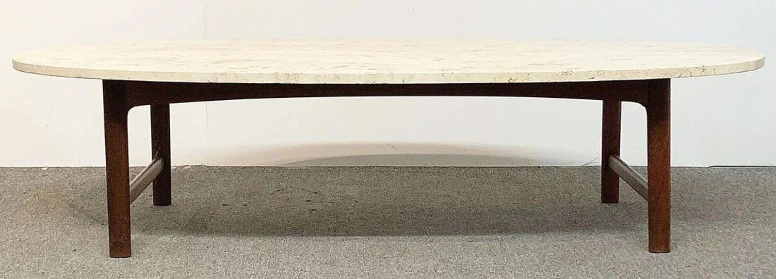 Dux Travertine Top Coffee Table: A Danish midcentury modern coffee or cocktail table by Dux, having an oval travertine top over a teak base. 16-1/2 in tall x 65-1/2 in wide x 29-1/2 in deep.