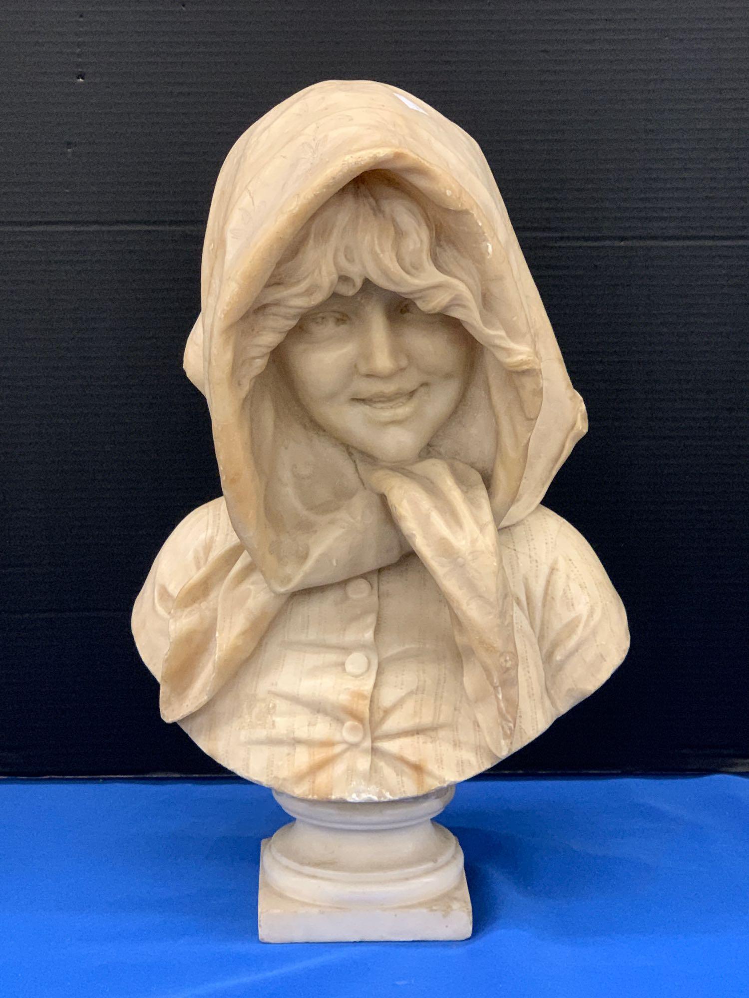 Carved Alabaster Bust of a Maiden: An unsigned carved alabaster bust of a maiden. 20in tall x 12in wide.