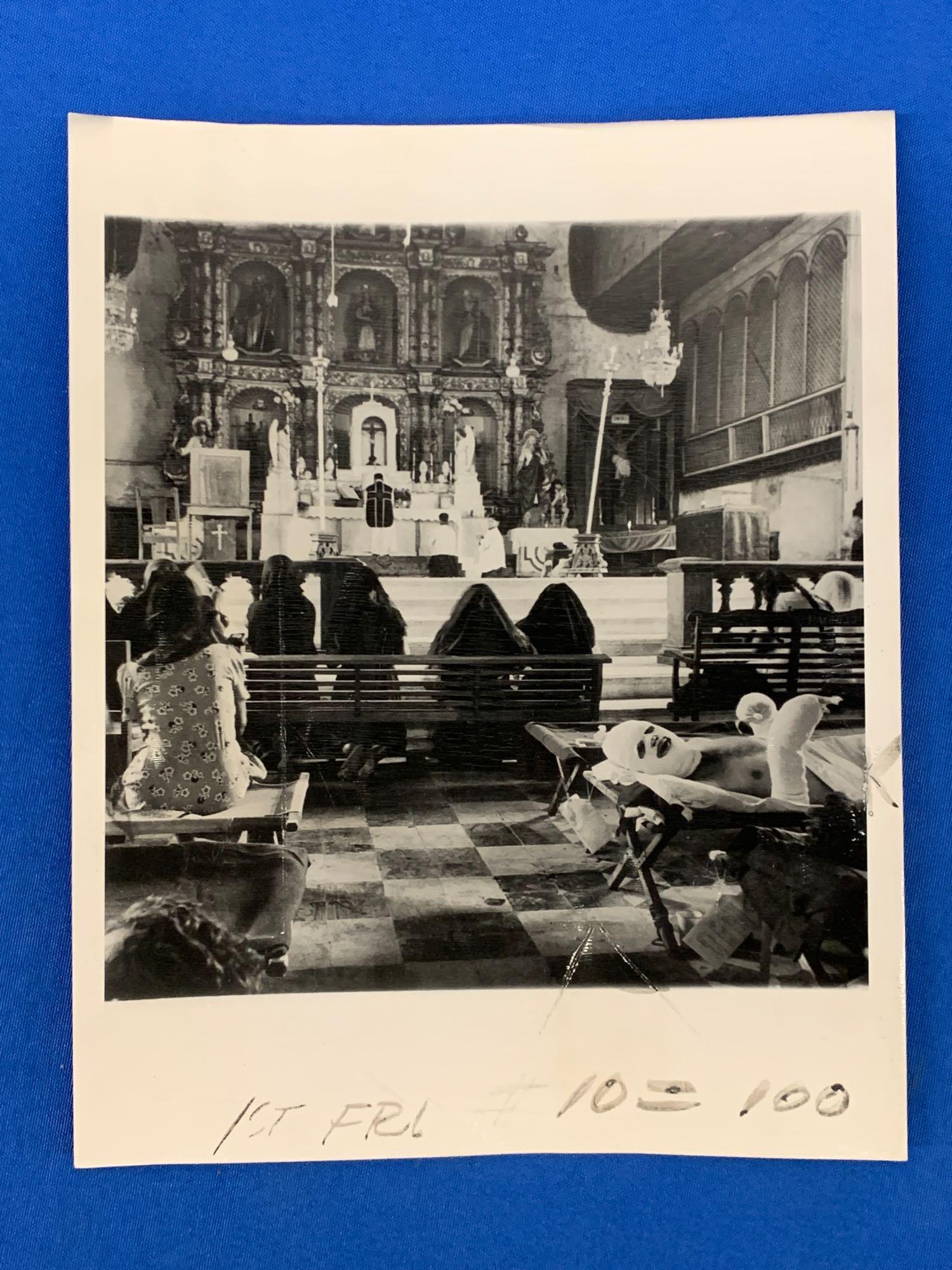 W. Eugene Smith. Photograph: W. Eugene Smith (American, 1918-1978). A photograph, titled "Wounded Lie in Leyte Cathedral", 1944. Associated Press Photo printed caption, crediting Smith, with red date stamp (December 22, 1944), an