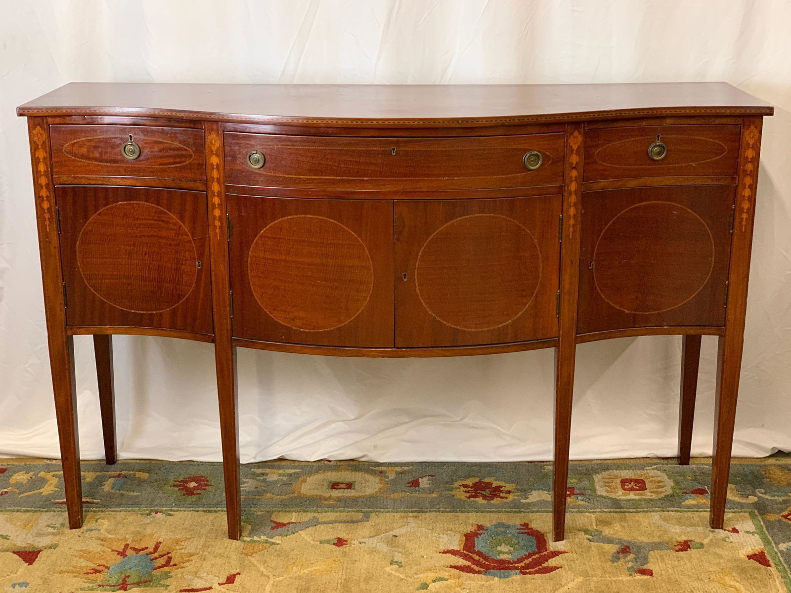 Federal-style Mahogany Sideboard: A Federal-style banded and inlaid mahogany sideboard. 40-1/2 in tall x 64-1/2 in wide x 22-1/2 in deep.