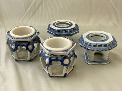 Four Japanese Sake Cup Stands: A grouping of four Japanese blue and white porcelain haidai or sake cup stands, each of pierced form. Taller: 2-1/2in tall x 2-3/4in wide.