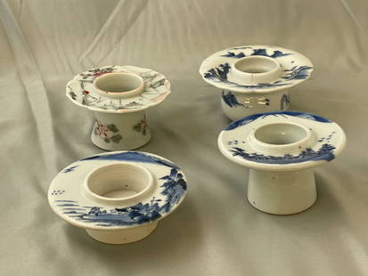 Four Japanese Porcelain Sake Cup Stands: A grouping of four Japanese porcelain haidai or sake cup stands. Tallest: 2in tall x 4in diameter.