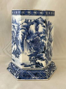 Blue & White Porcelain Brush Pot: A blue and white porcelain brush pot of hexagonal form with Shan Shui-style mountainous landscape design, and with calligraphy markings and signed on base. 5-3/4in tall x 5in wide.