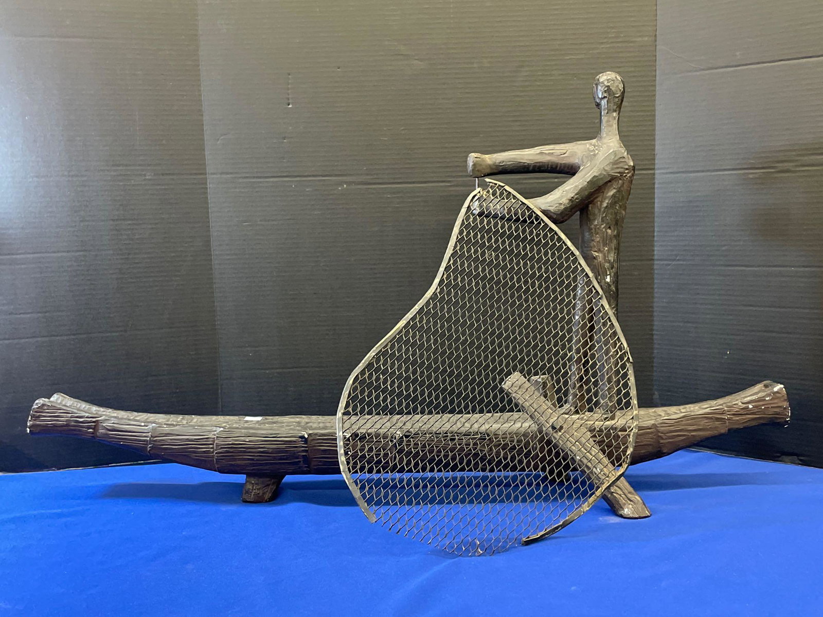 Degroot. Sculpture of a Man on a Boat (1 of 5)