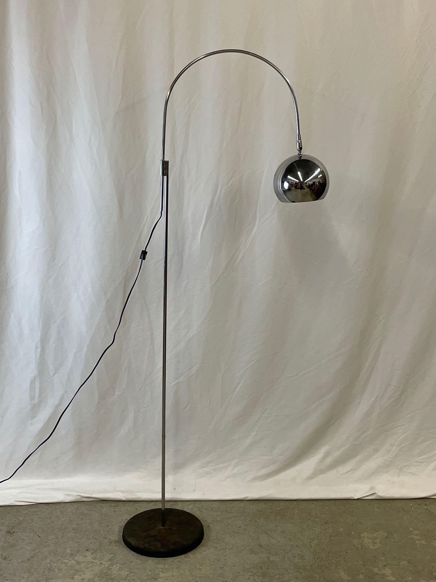 70s Modern Floor Lamp: A 1970s modern chrome arc floor lamp with ball shade in the style of Robert Sonneman. 68in tall x 25in wide.